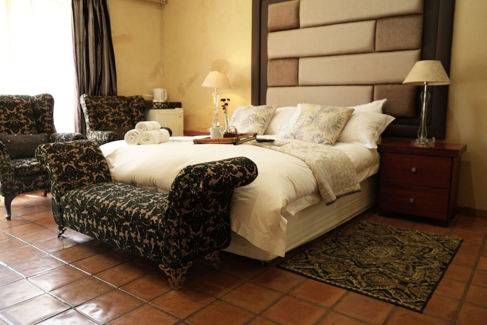 Tuscan Lodge Polokwane Deluxe Suite, Patio, Garden View 8