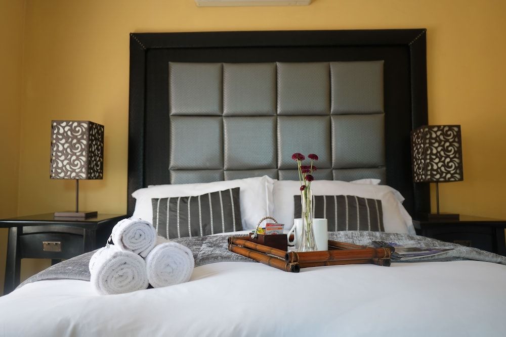 Tuscan Lodge Polokwane Deluxe Suite, Patio, Garden View 5