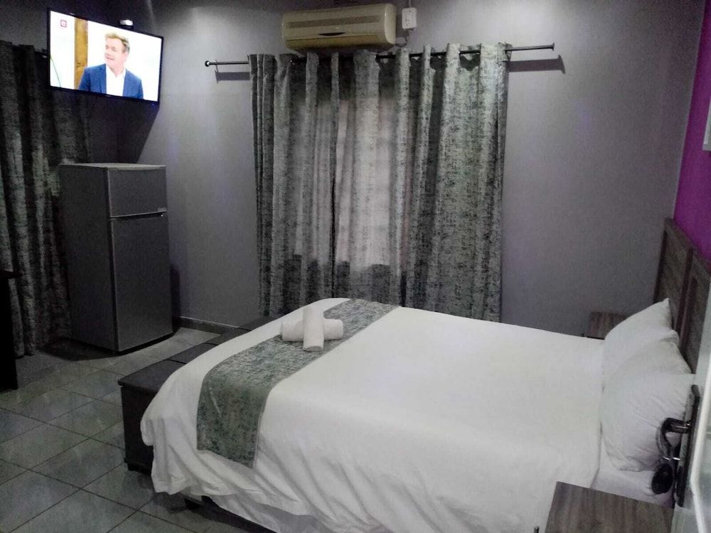 DE ELLAS BOUTIQUE LODGE Classic Double Room, 1 Double Bed, Refrigerator, Garden View 3