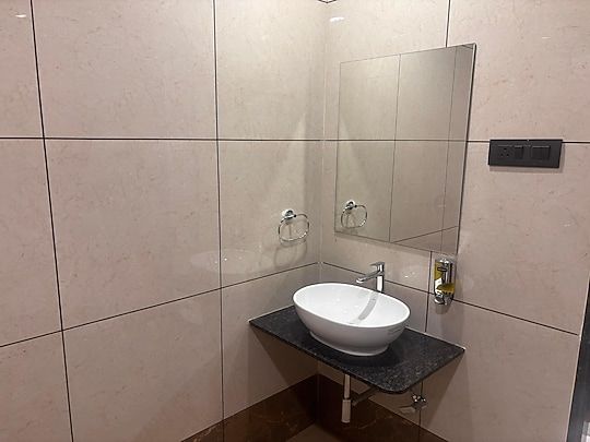 Hotel Tulsi Icon Deluxe Room 4