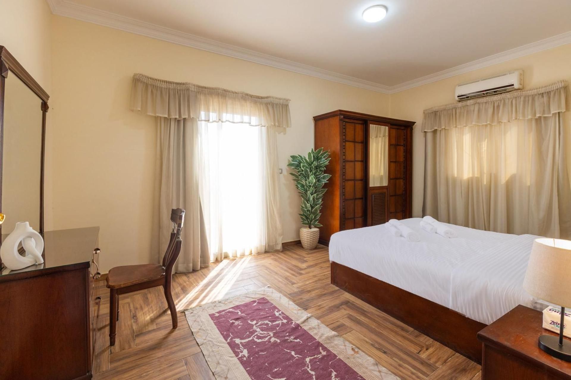 Three-Bedroom Apartment with Balcony