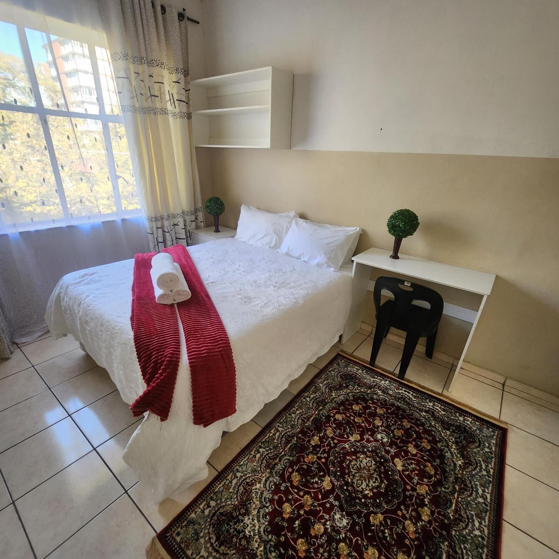 Queen Room with Shared Bathroom