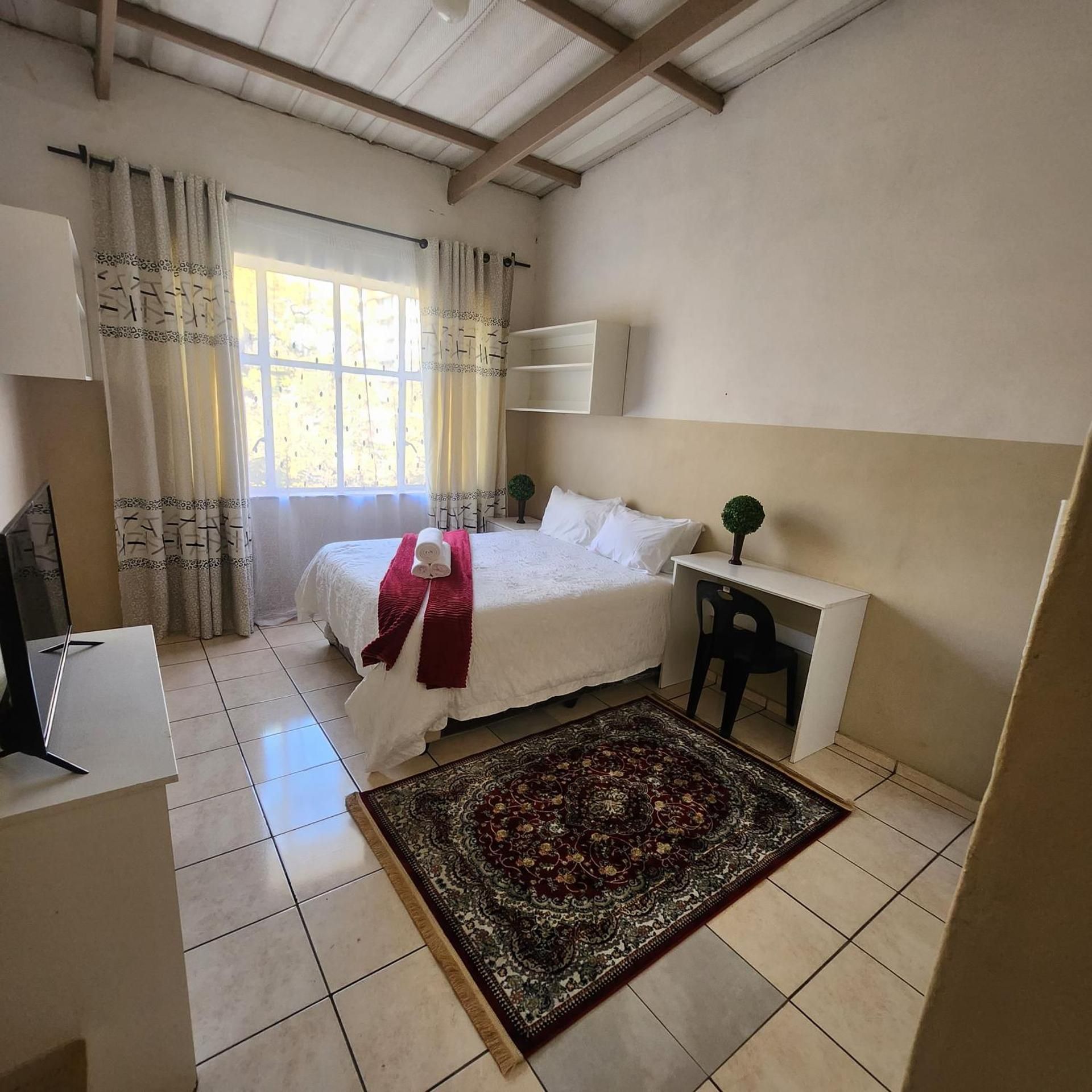 Queen Room with Shared Bathroom