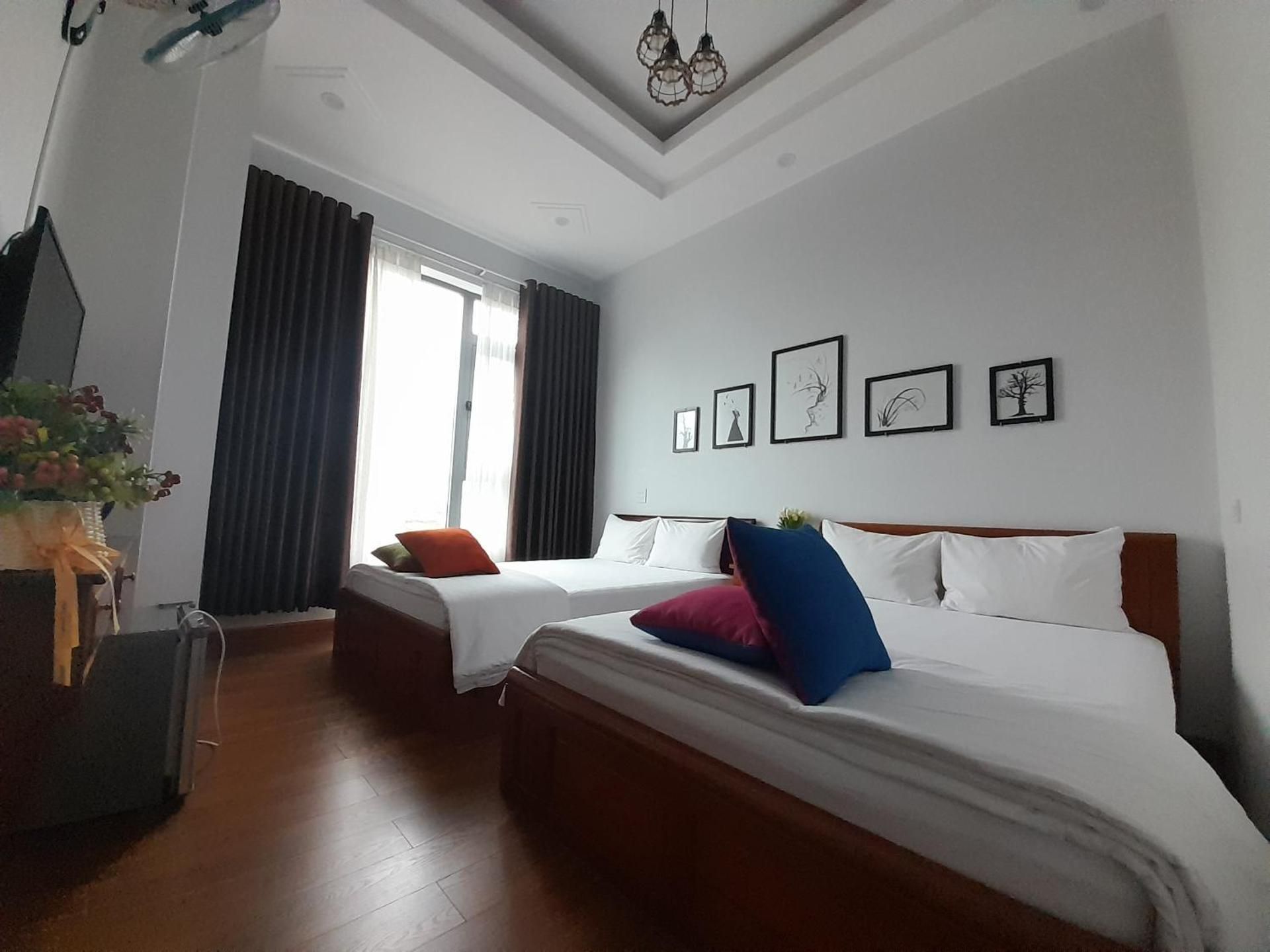 Viet Homestay Quy Nhon Standard Queen Room with Two Queen Beds 2