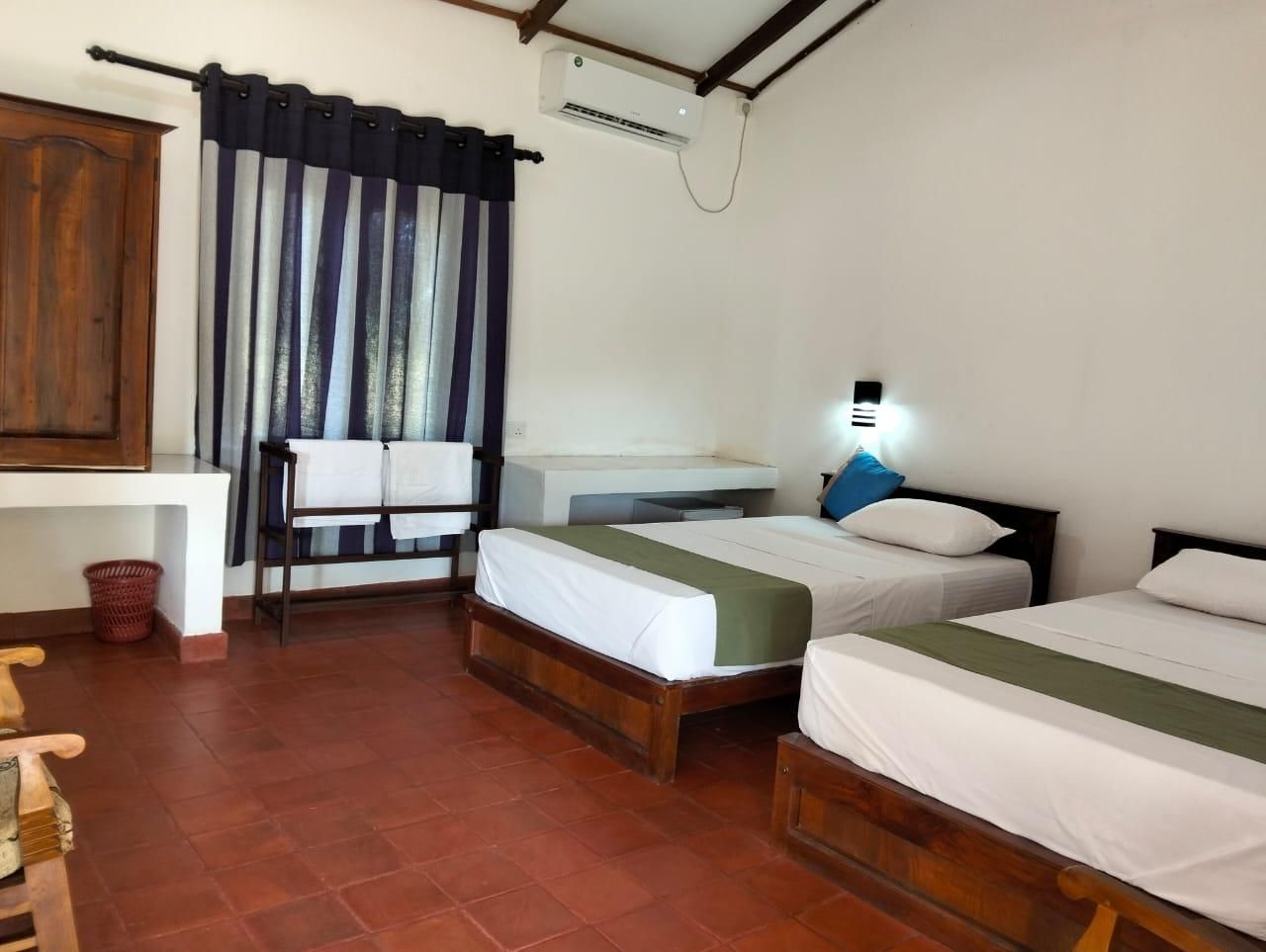 Triple Bed Room With Air Conditioning