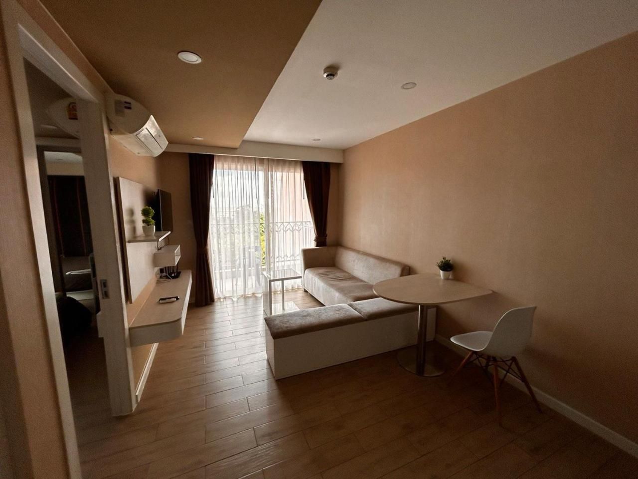 One-Bedroom Apartment with Balcony and City View