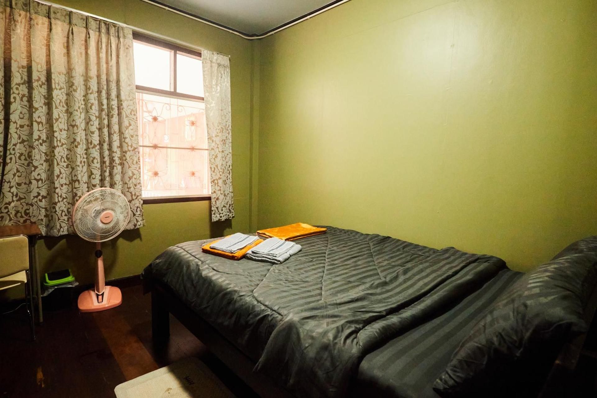 Queen Room with Shared Bathroom