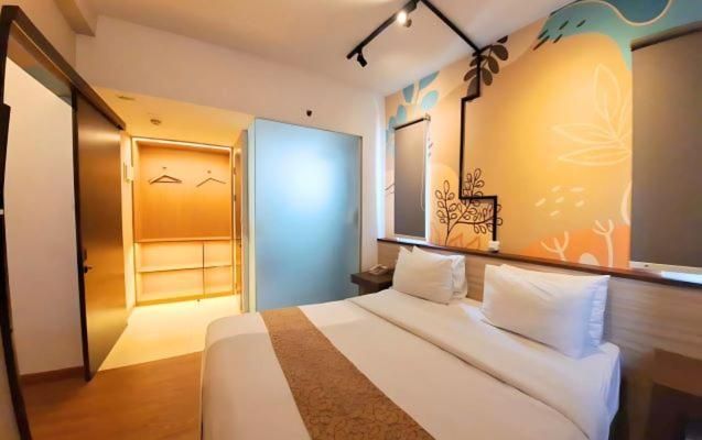 Deluxe - 1 Queen Bed