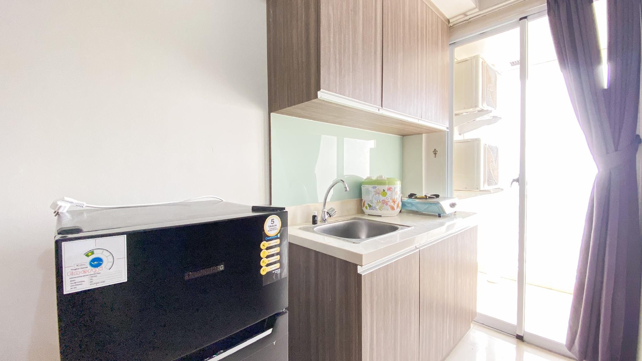 Cozy 2BR Apt at Vittoria Residence By Travelio