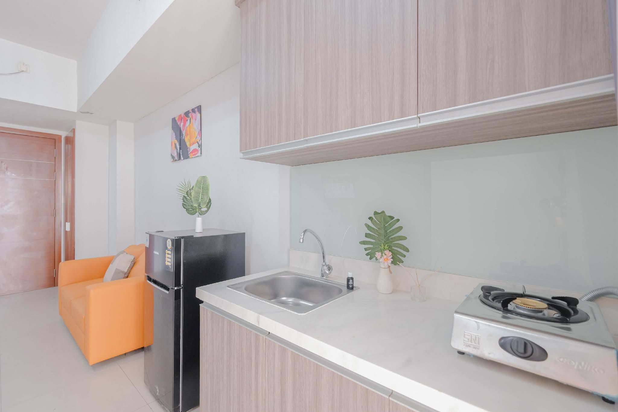 Minimalist 2BR Apt Vittoria Residence By Travelio