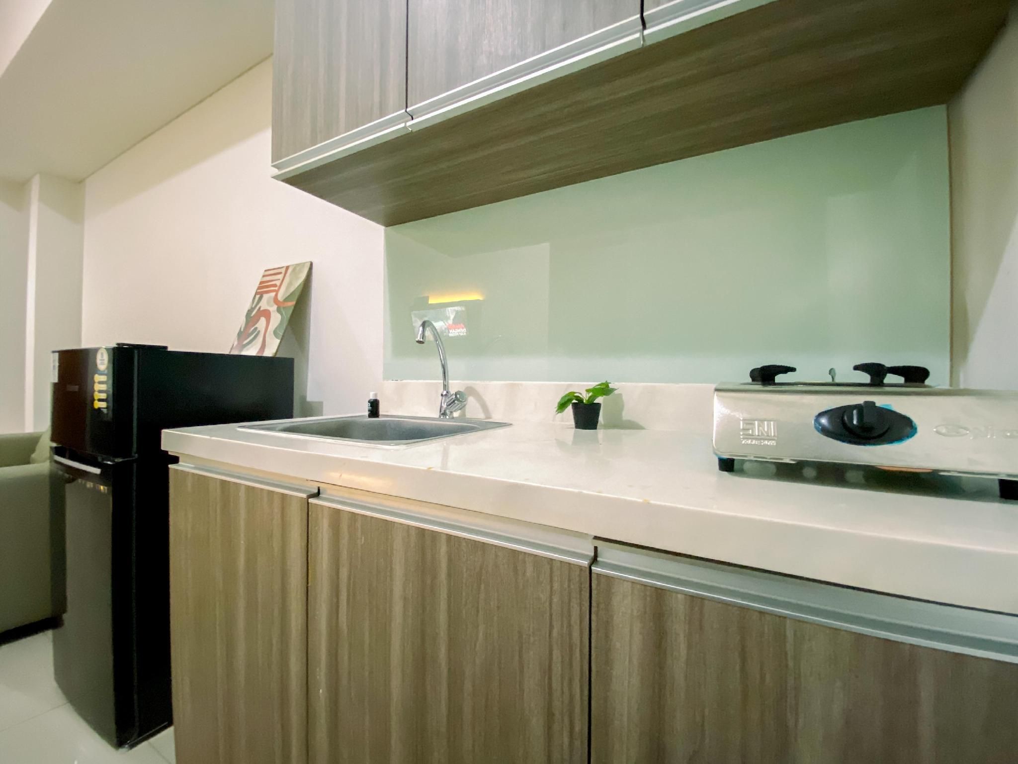 Spacious 2BR Corner Vittoria Residence By Travelio