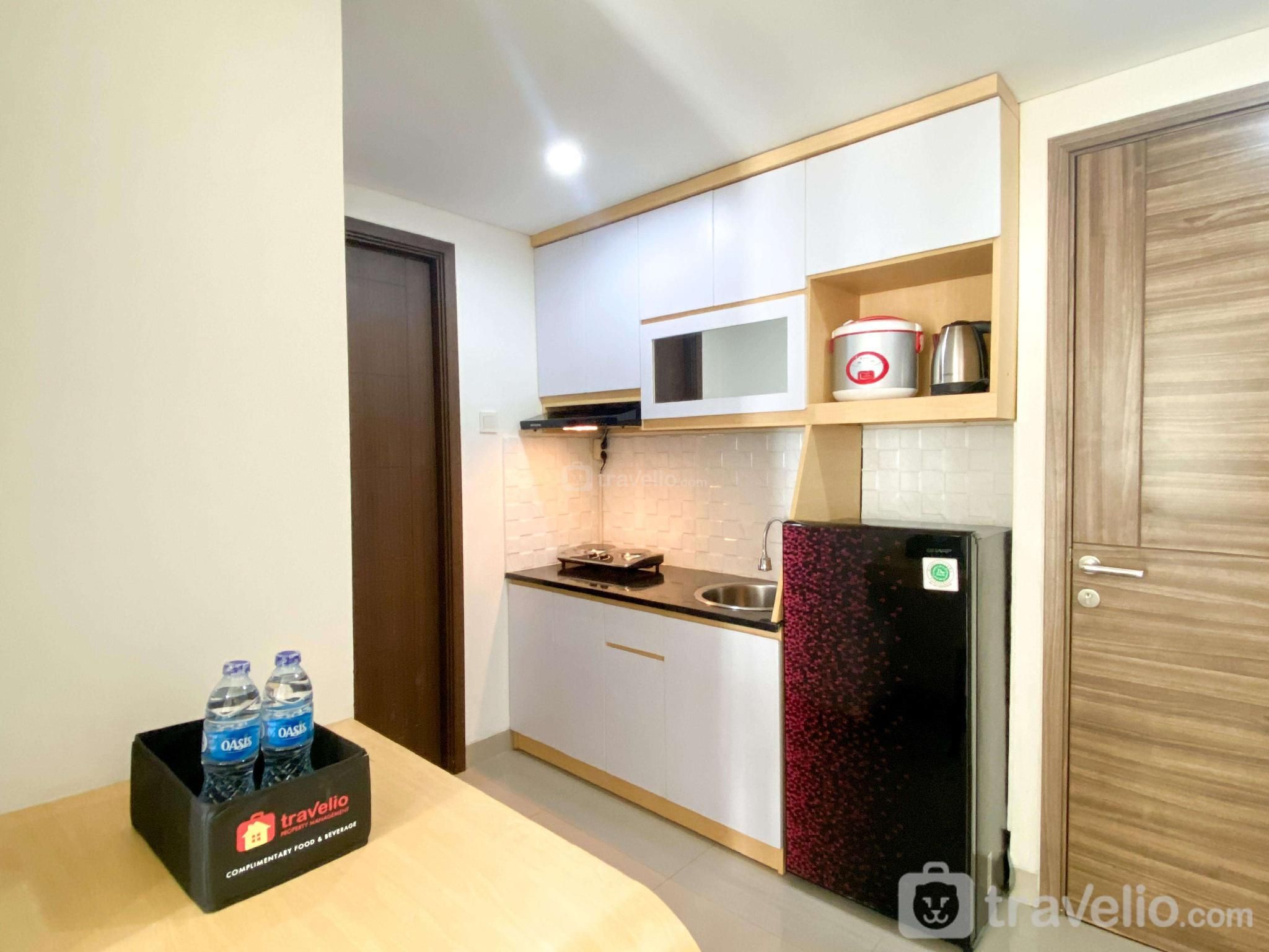 Enjoy 1BR Grand Dhika City Jatiwarna By Travelio