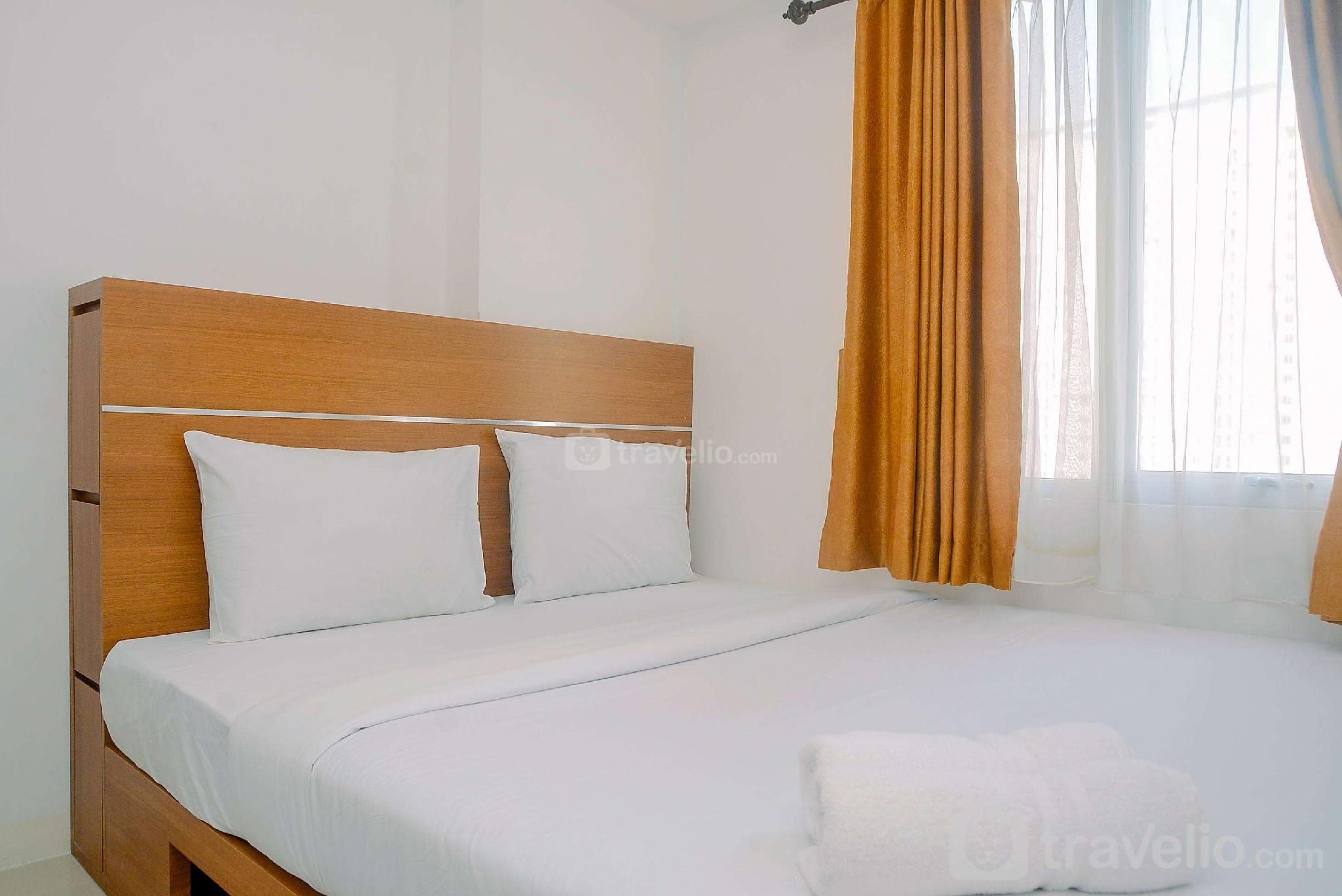 Comfortable 2BR Bassura City Apartment By Travelio