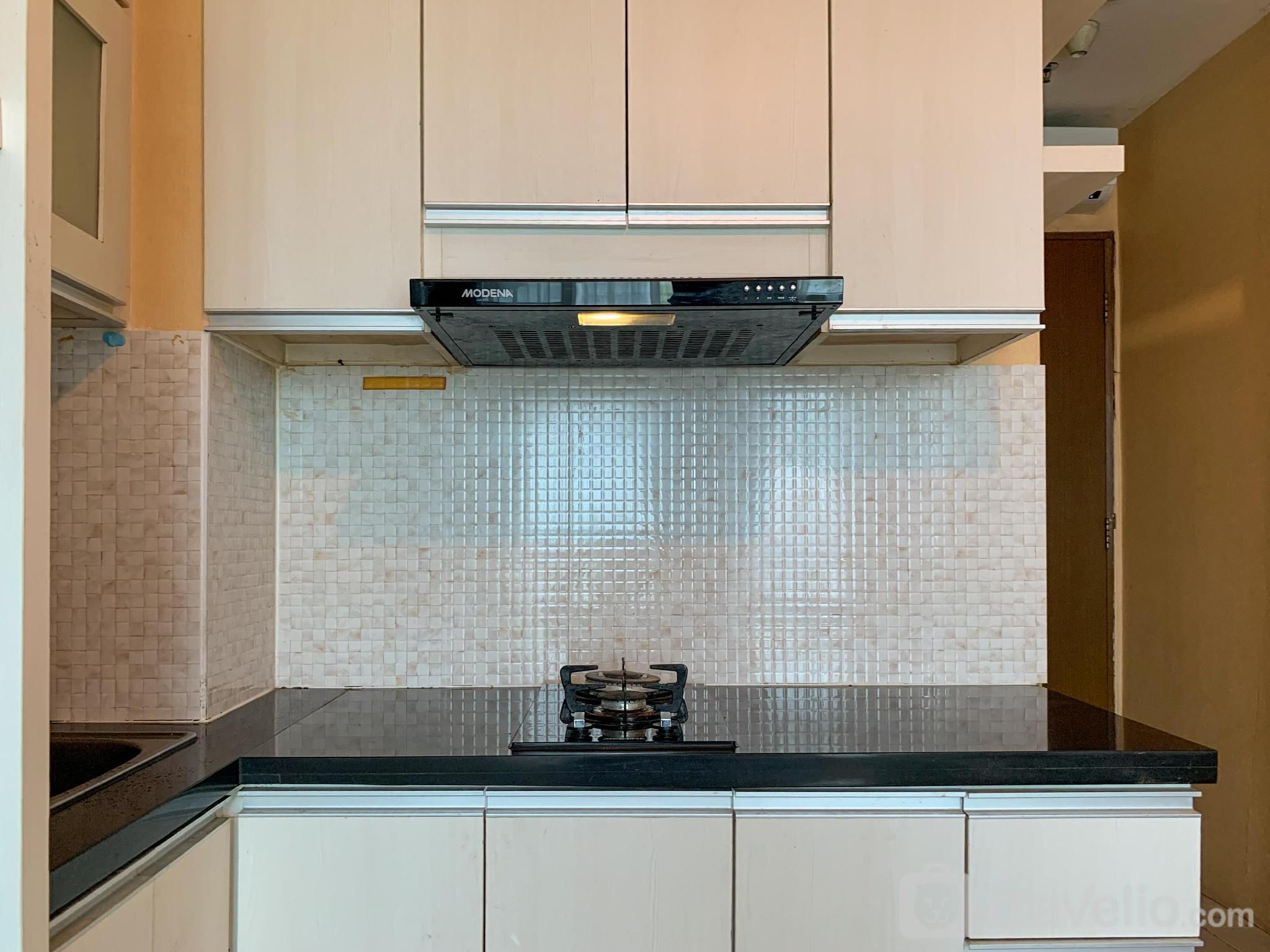 Warm and Cozy 2BR at Tifolia Apartment By Travelio