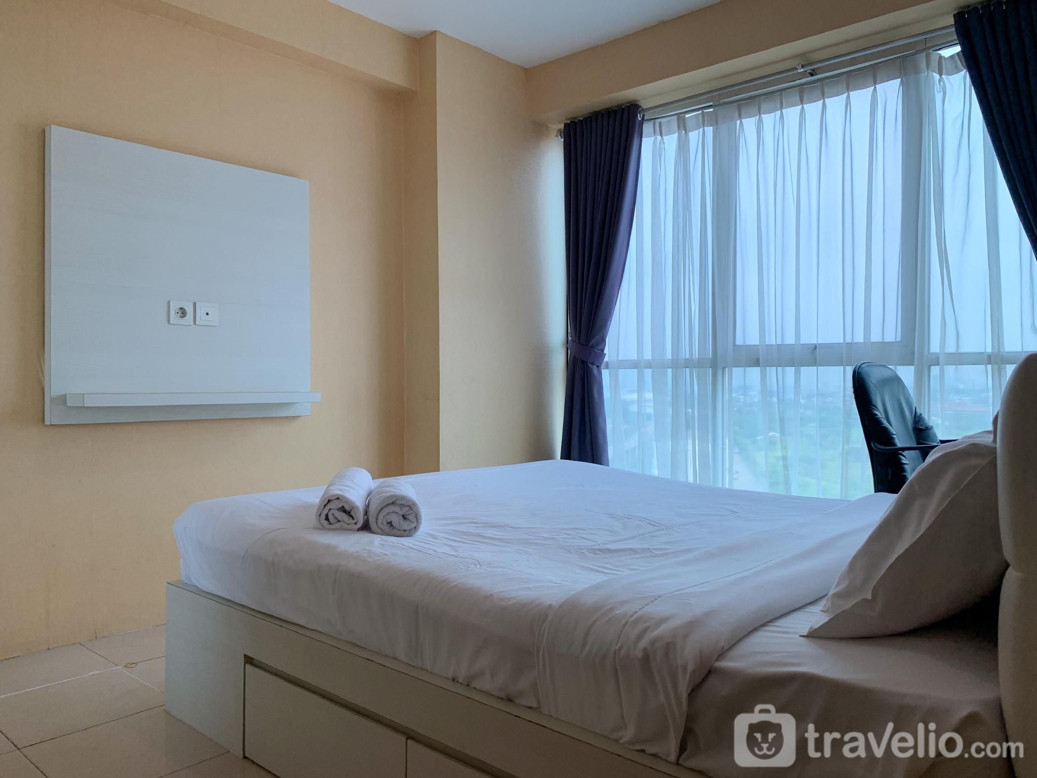 Warm and Cozy 2BR at Tifolia Apartment By Travelio