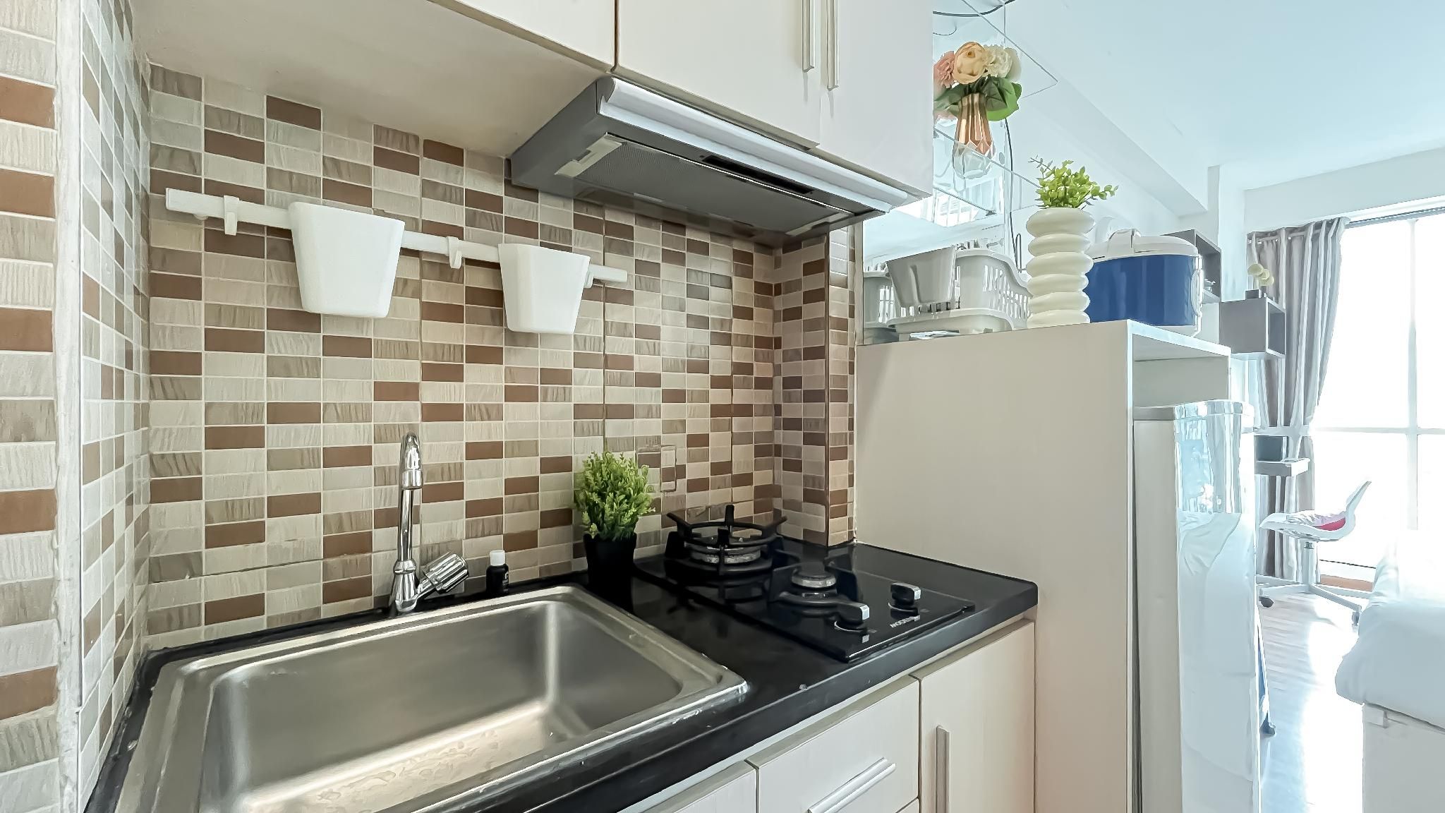 Neat Studio Room at Tifolia Apartment By Travelio