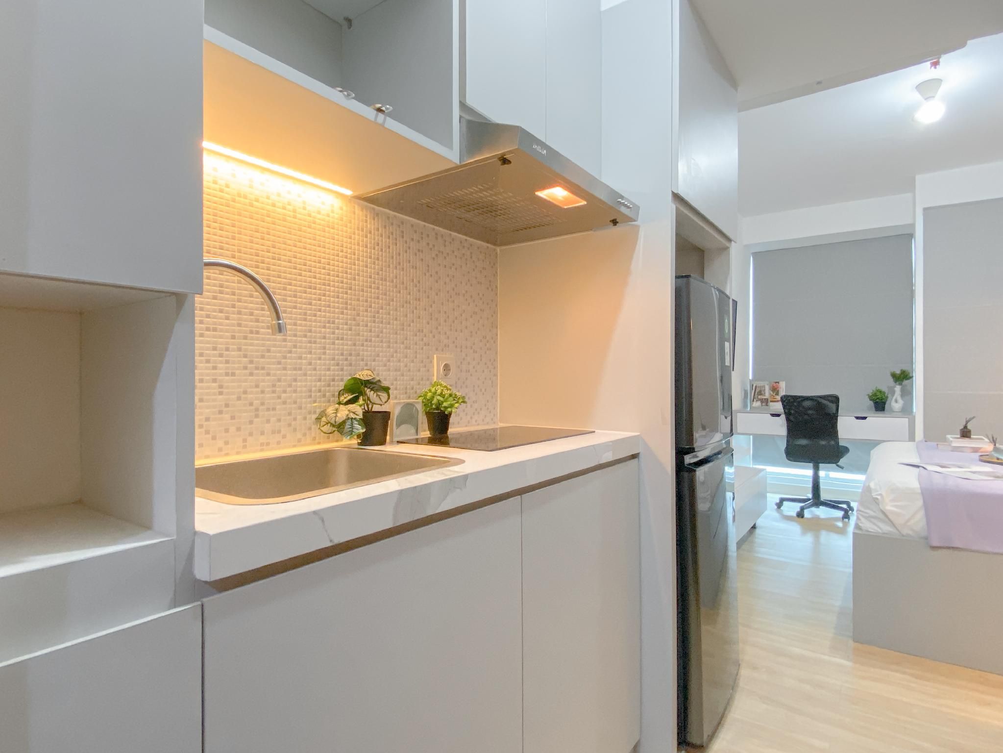 Warm Studio at Tifolia Apartment By Travelio