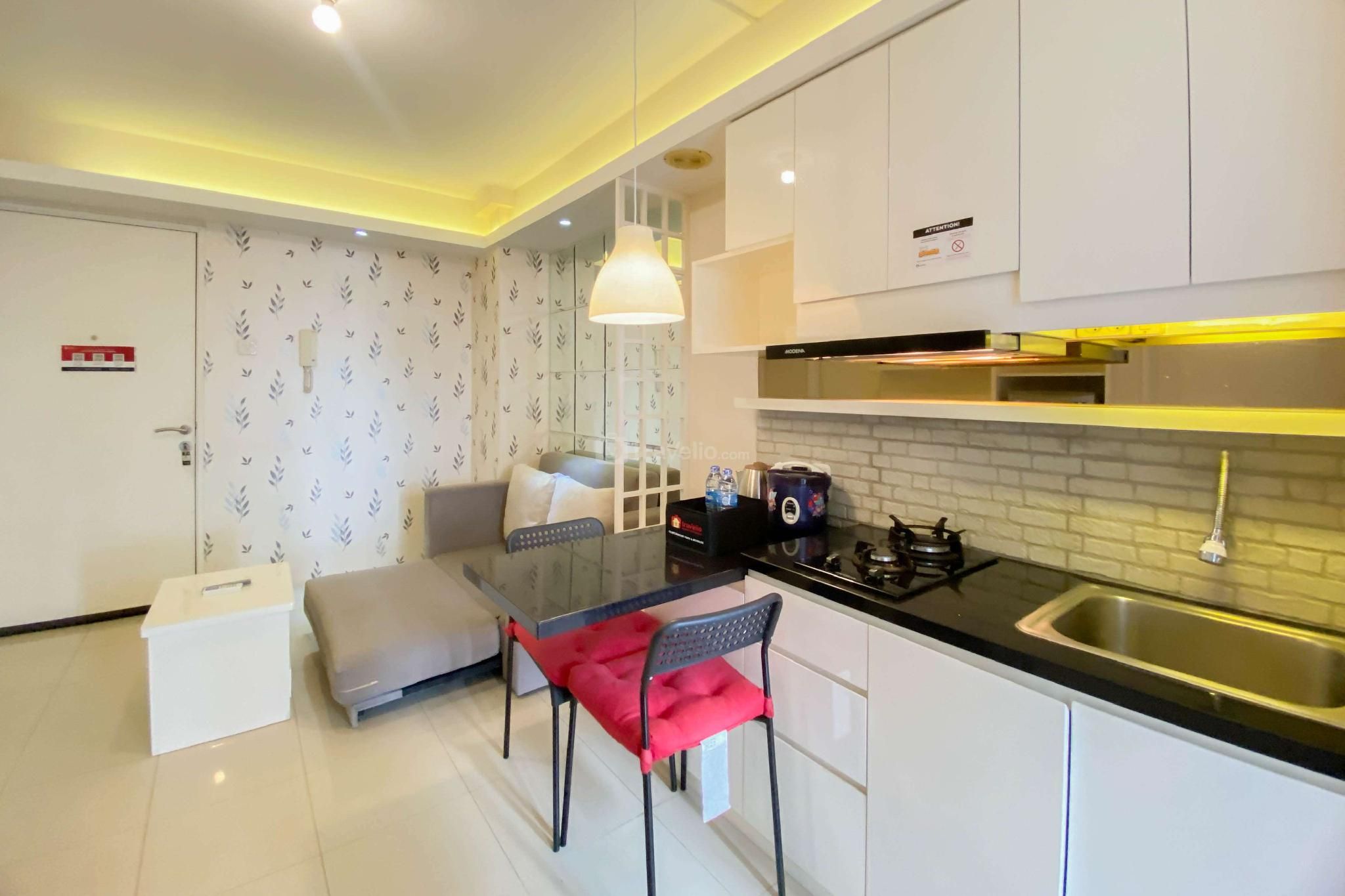 Spacious and Homey 2BR at Bassura City By Travelio