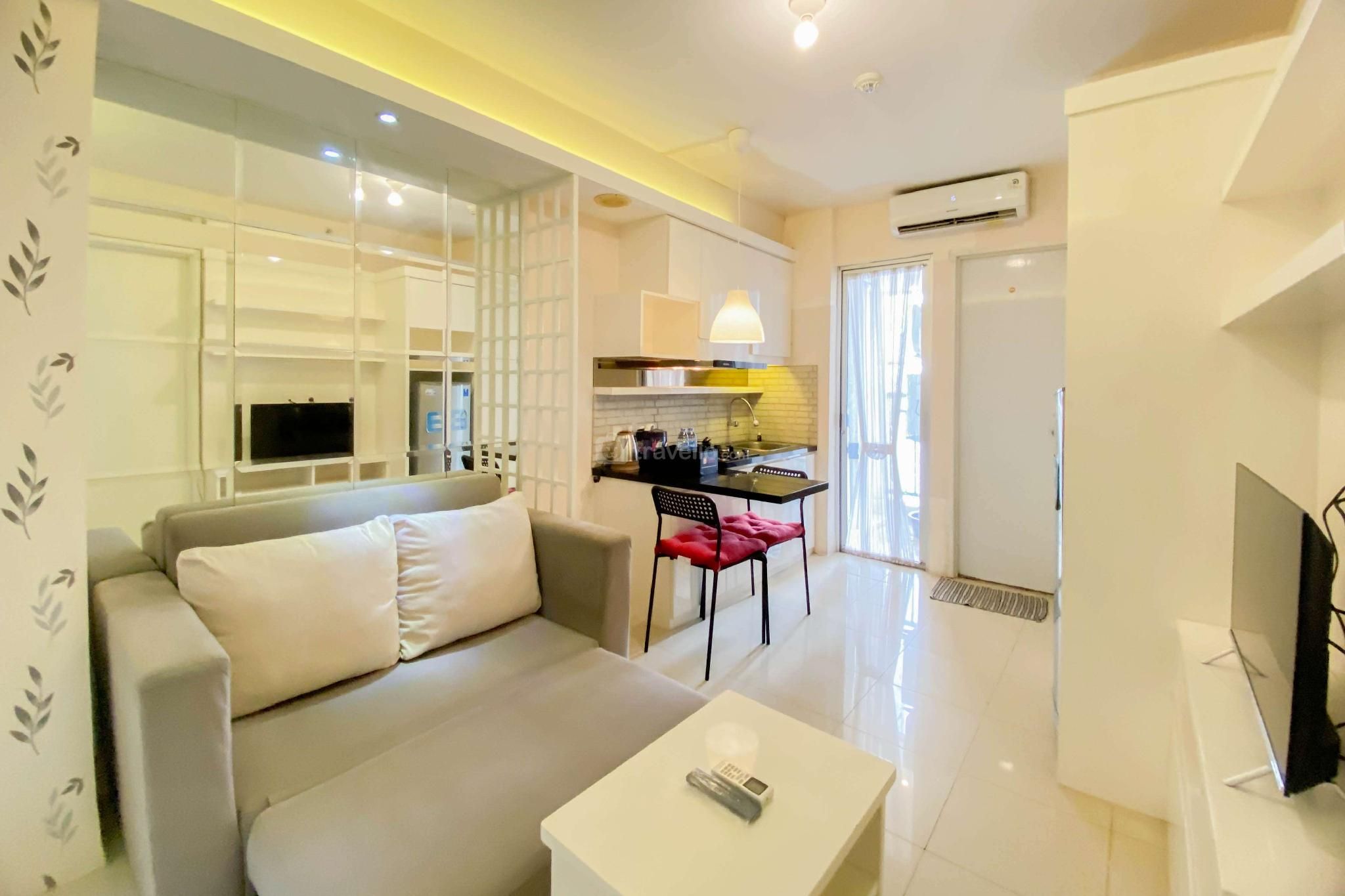 Spacious and Homey 2BR at Bassura City By Travelio