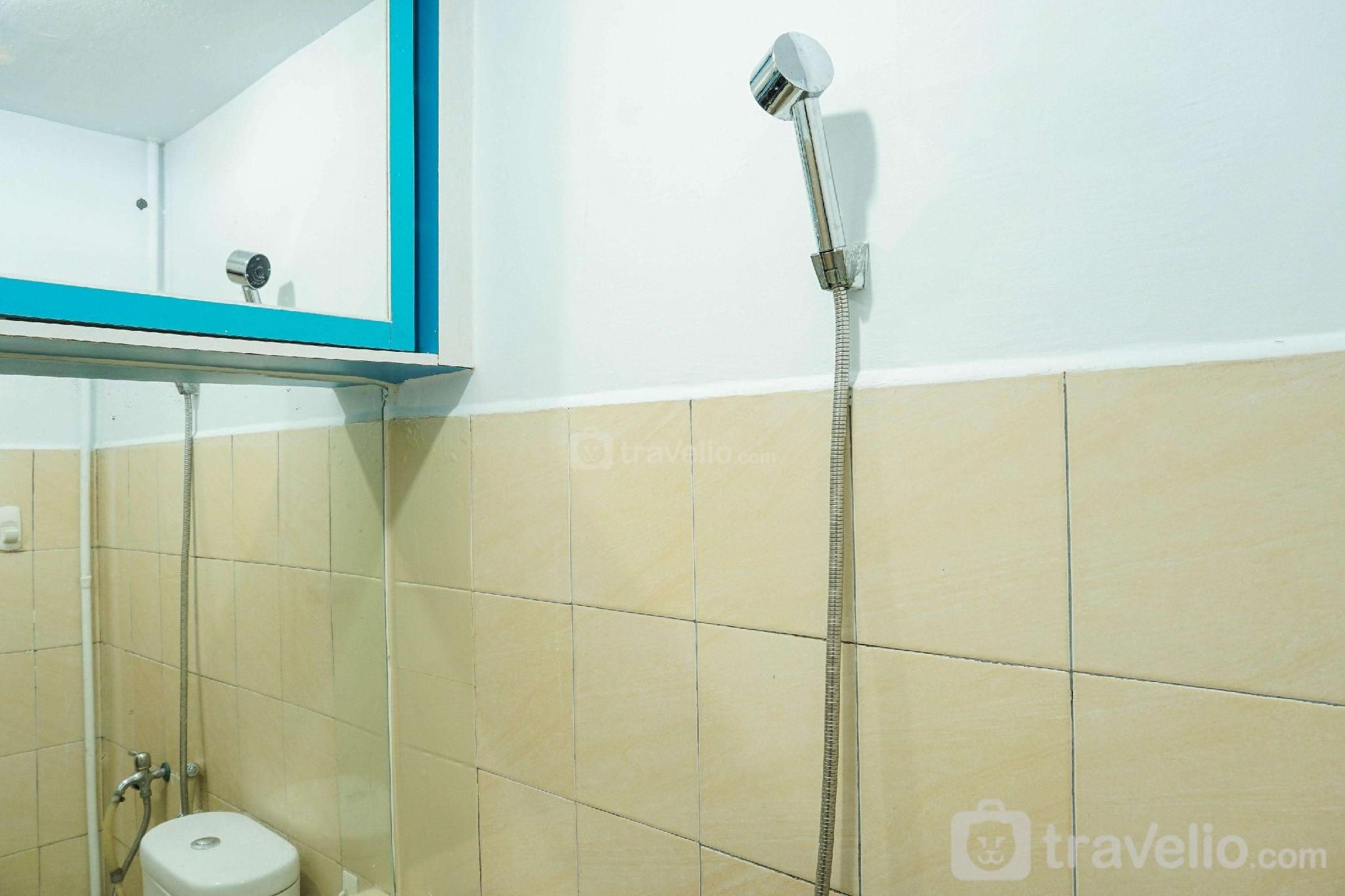 Gorgeous 2BR Green Pramuka Apartment By Travelio