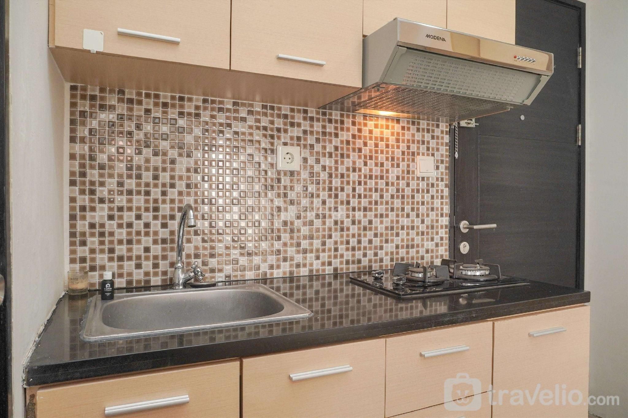 Homey Warm 1BR Belmont Residence Puri By Travelio