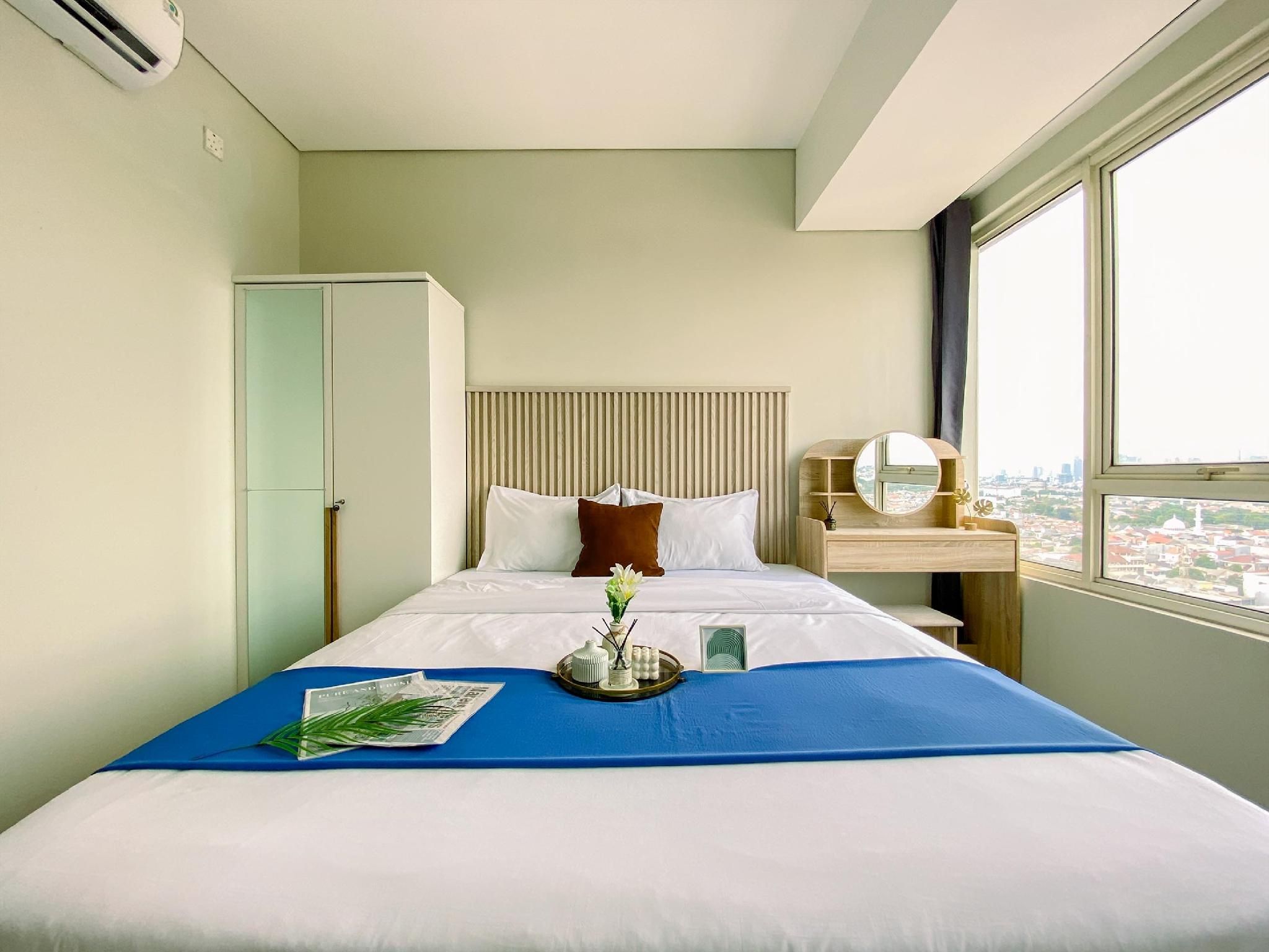 Brand New and Homey 2BR Nifarro Park By Travelio