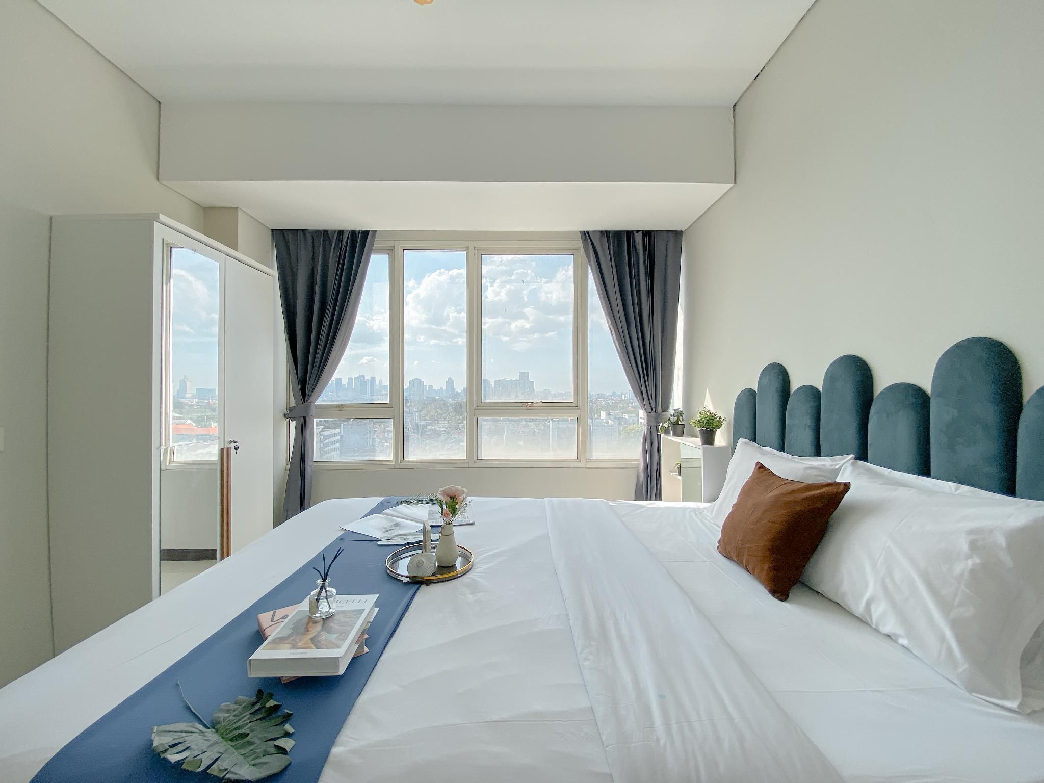 Minimalistic Designed 2BR Nifarro Park By Travelio