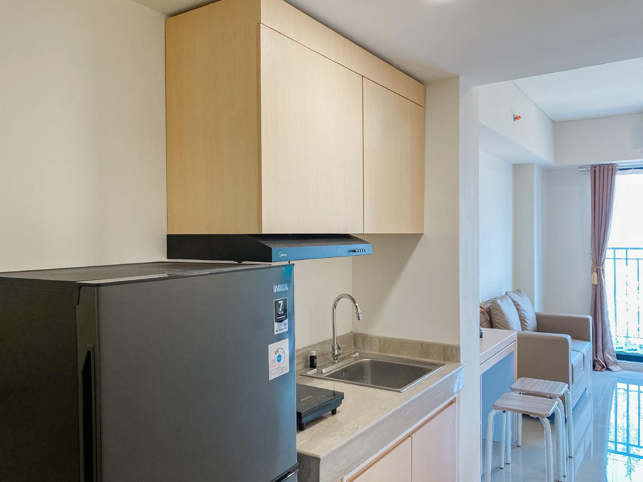 Convenient Tidy 2BR Meikarta Apartment By Travelio