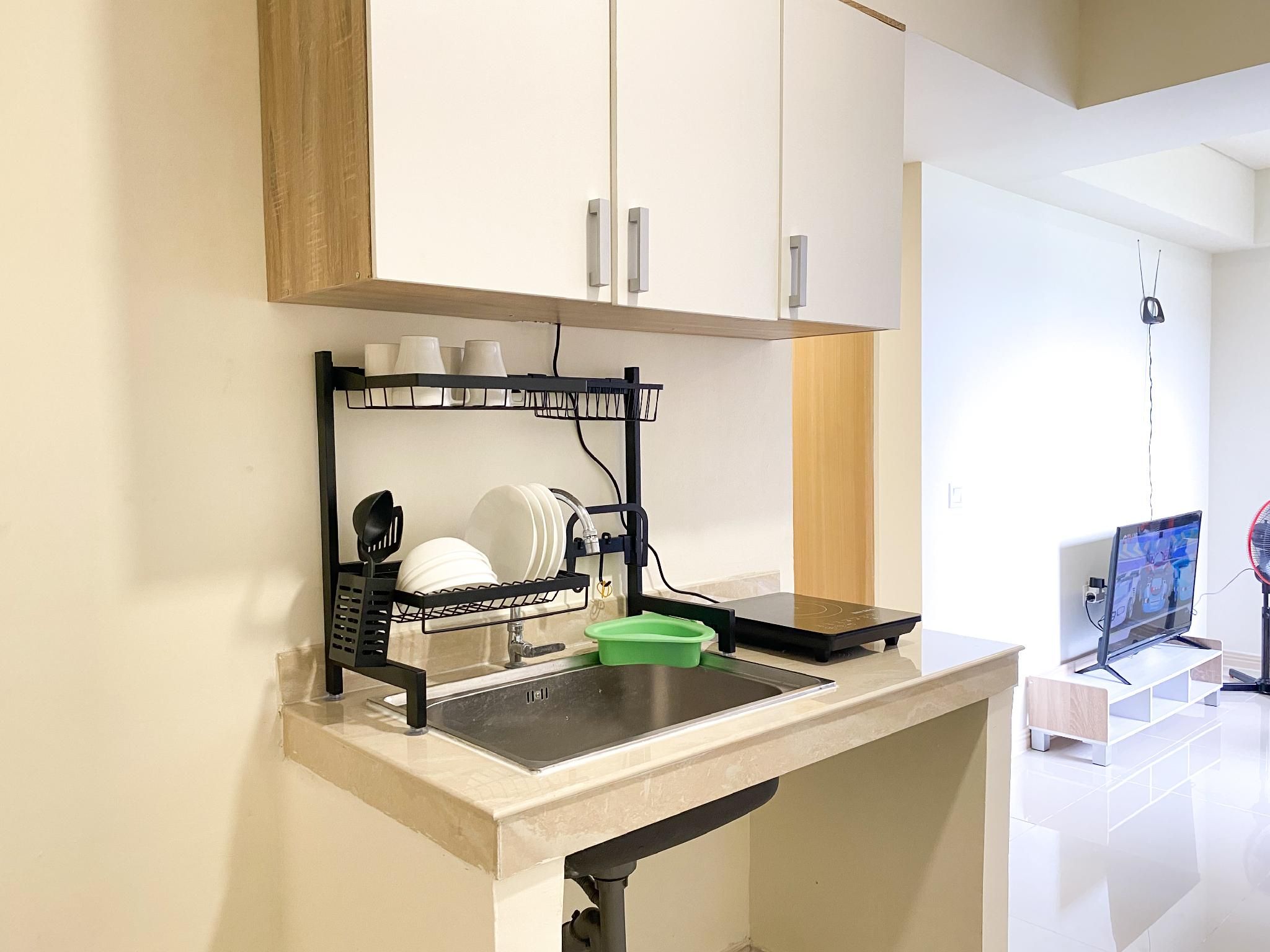 Restful Simply Look 2BR Meikarta Apt By Travelio
