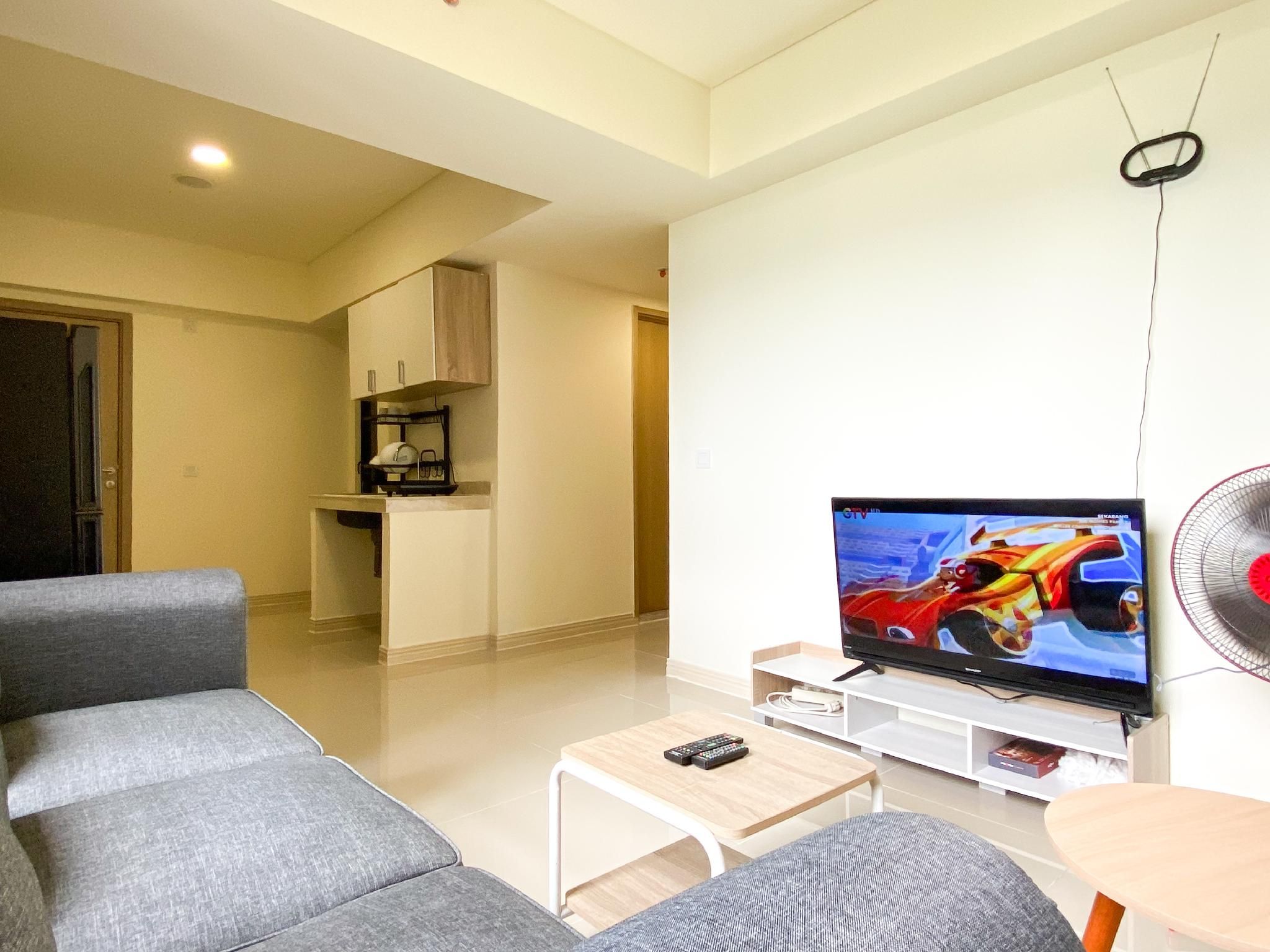 Restful Simply Look 2BR Meikarta Apt By Travelio