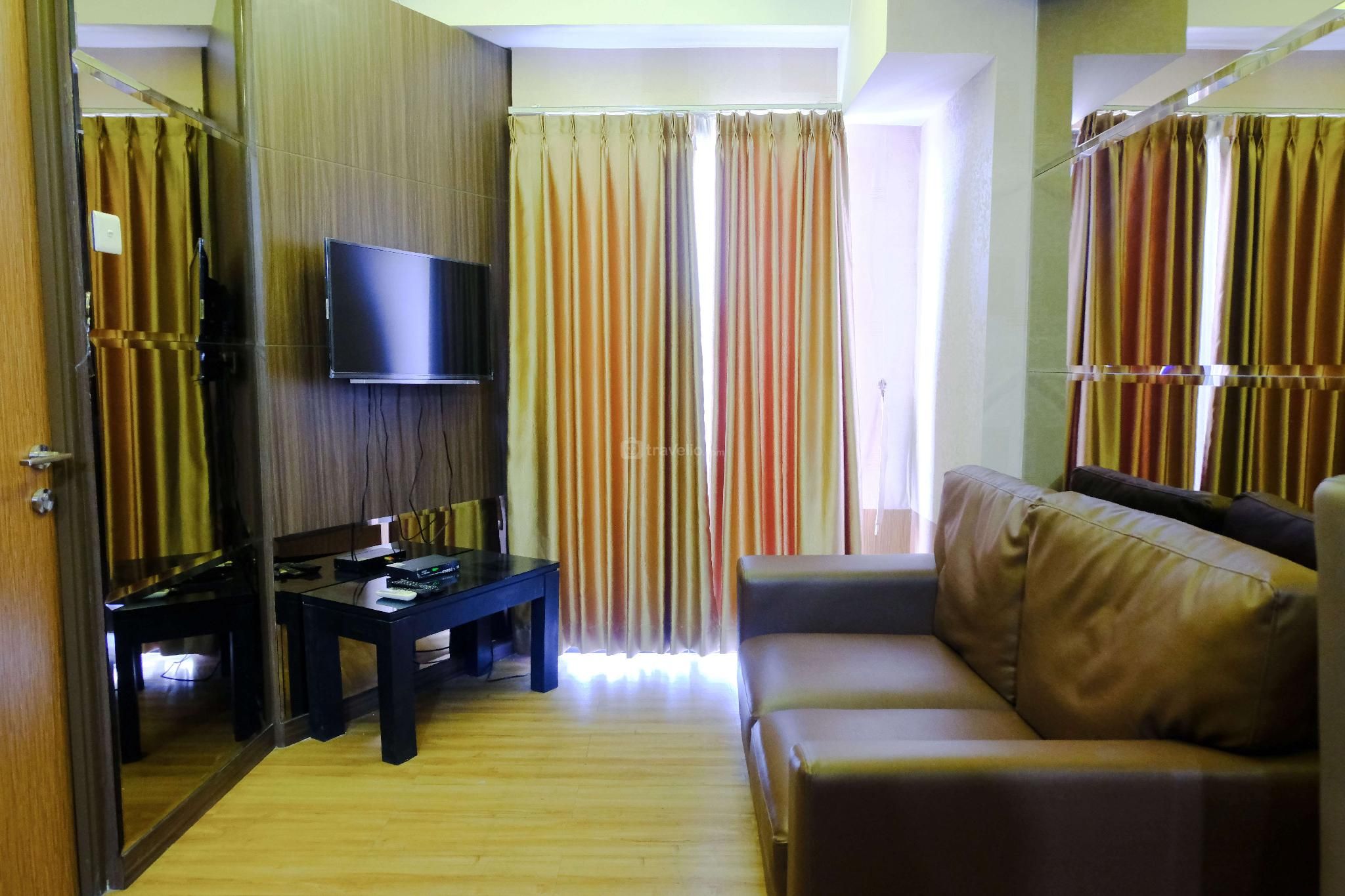 Strategic 2BR Tamansari Panoramic Apt By Travelio