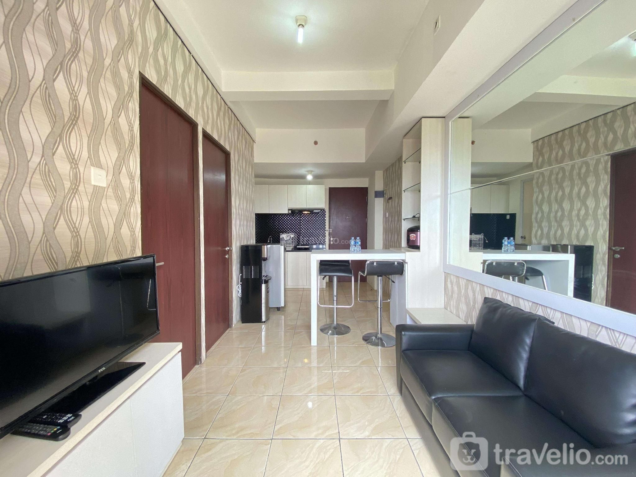 Bright 2BR at Tamansari Panoramic Apt By Travelio