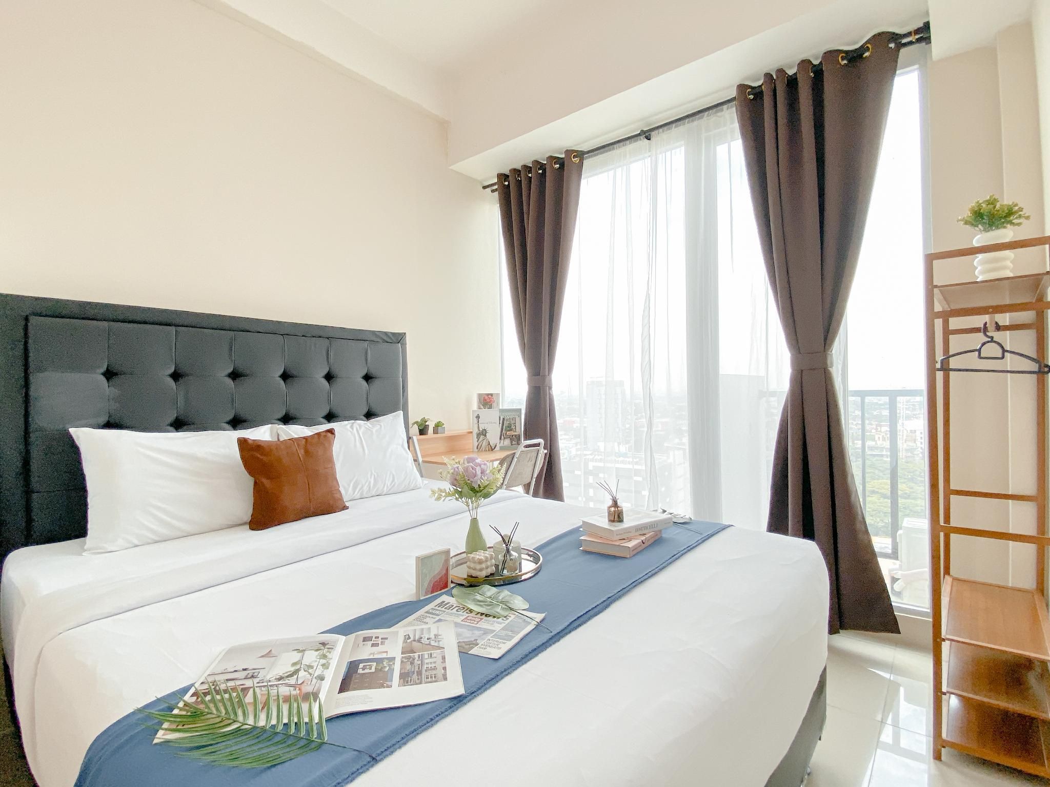 Comfy Studio Apt at Tree Park City BSD By Travelio