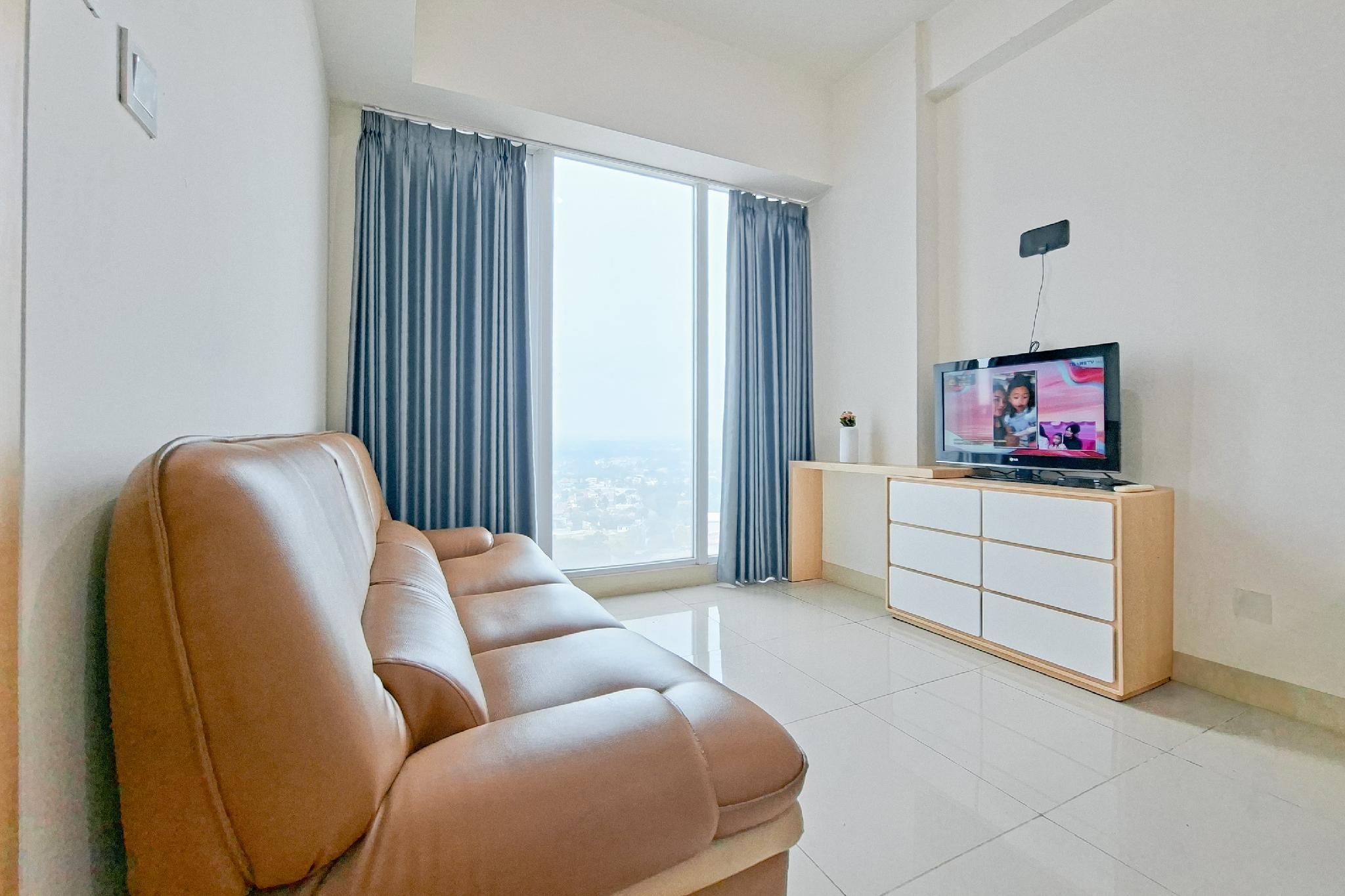 Modern Minimalist 1BR at Tree Park BSD By Travelio