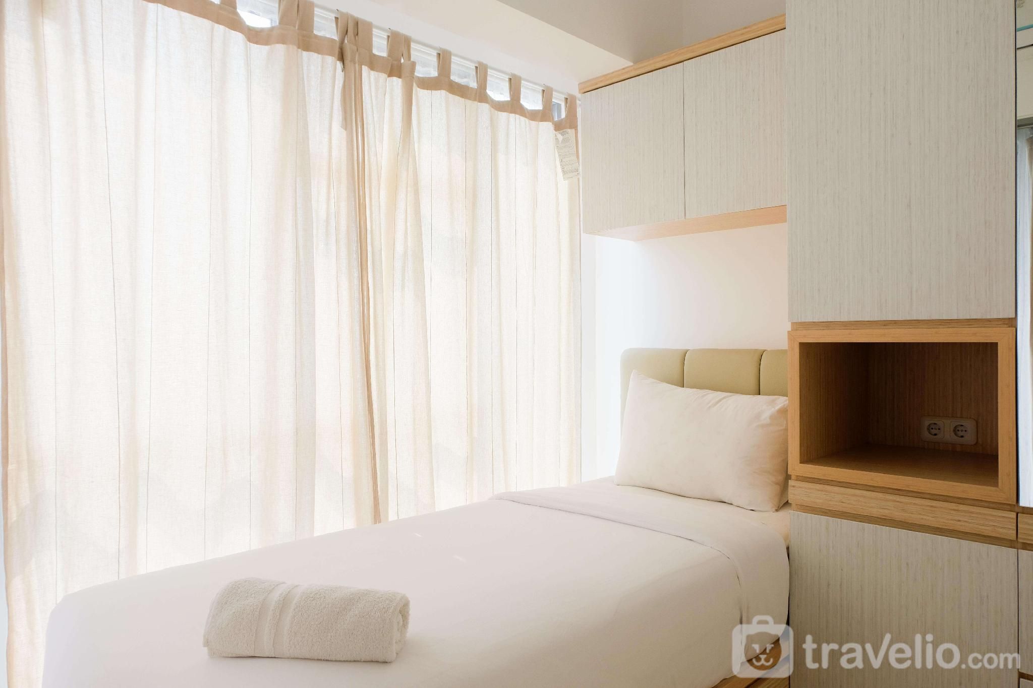 Comfy 2BR @ M-Town Residence Apartment by Travelio