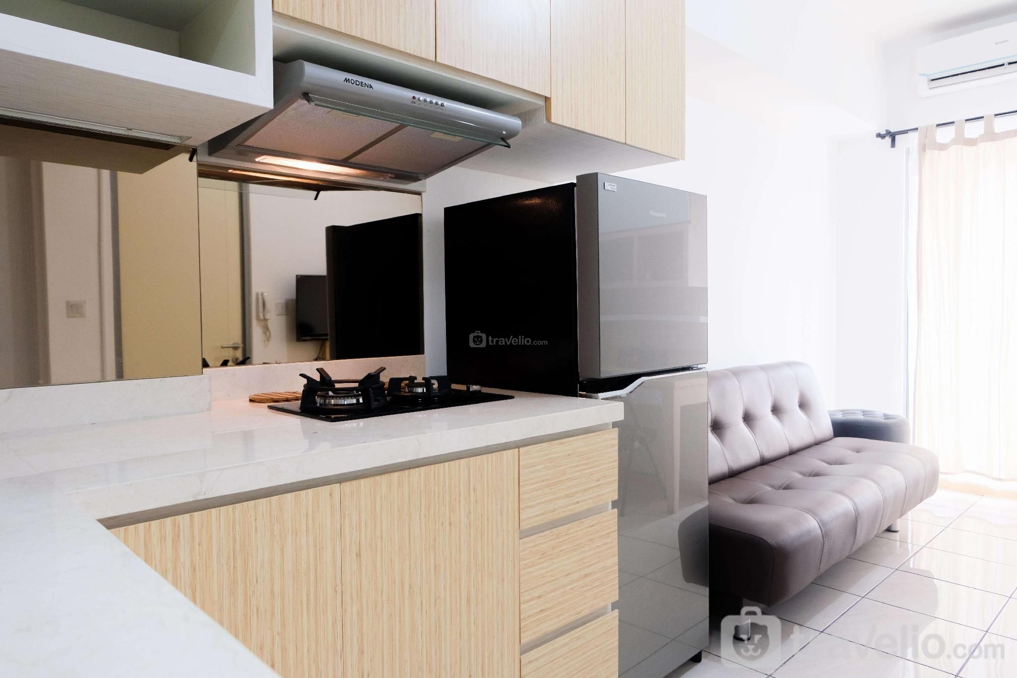 Comfy 2BR @ M-Town Residence Apartment by Travelio