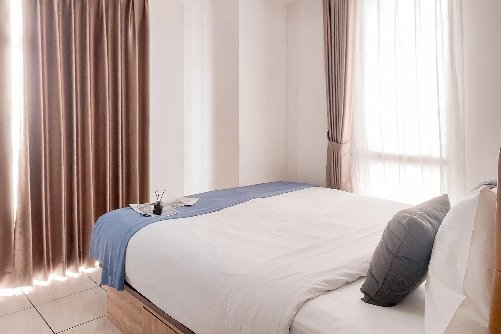 Comfy 1BR Apt at M-Town Residence By Travelio