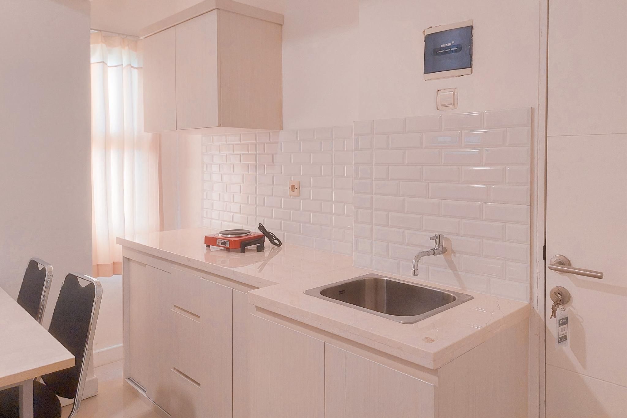 Simply Homey 2BR Urbantown Serpong Apt by Travelio