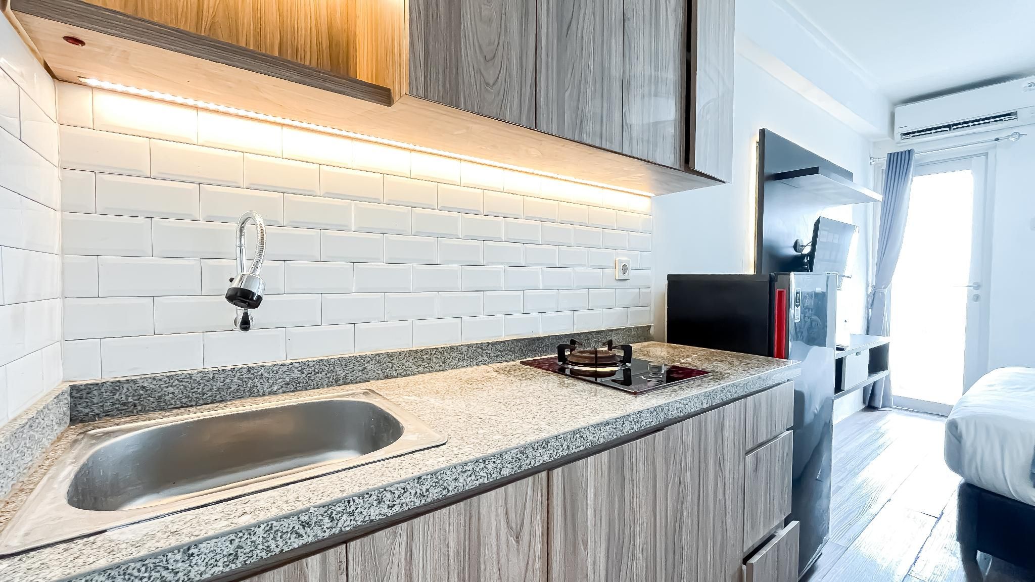 Cozy Good Studio Apt Urbantown Serpong By Travelio