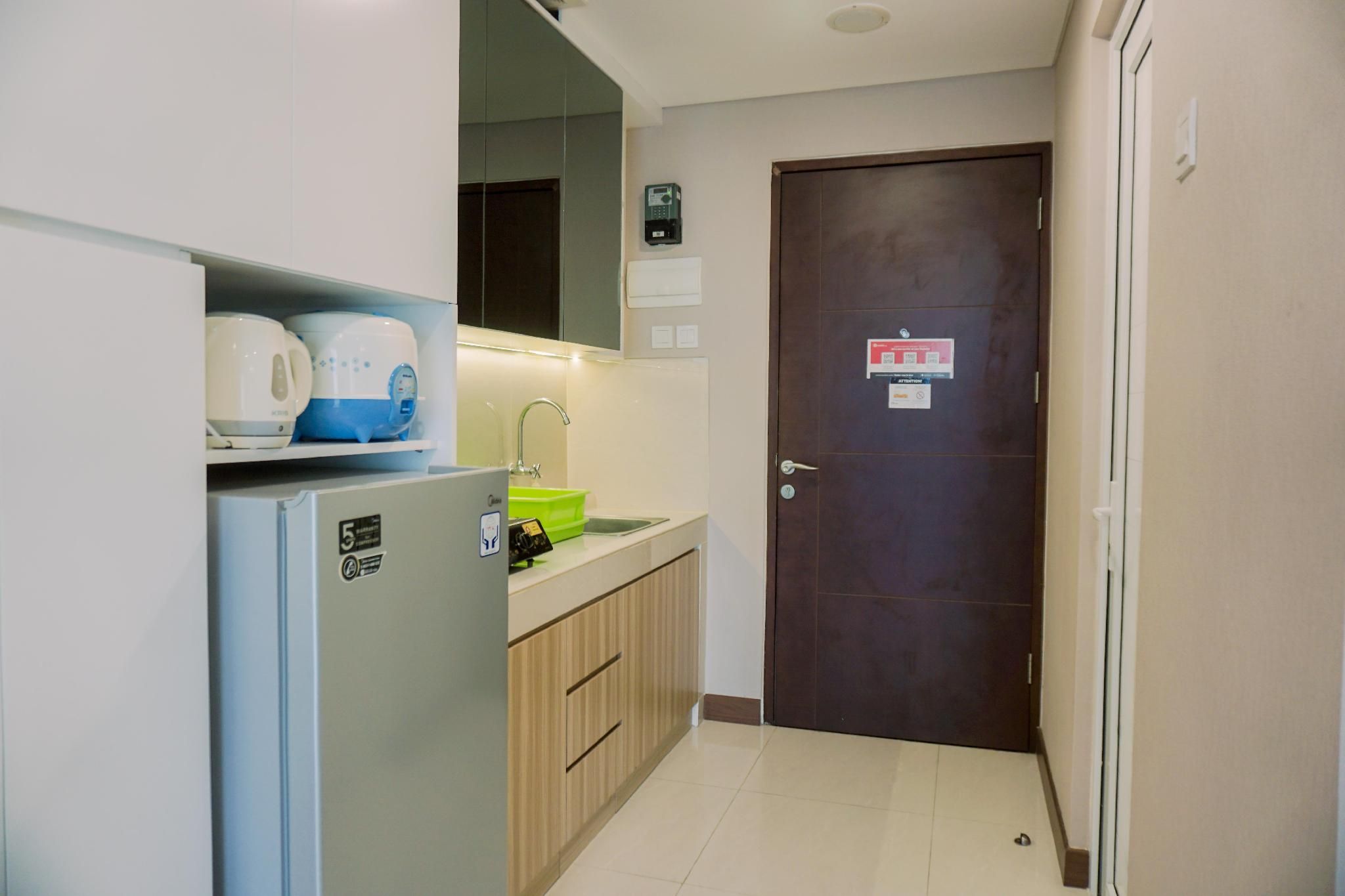 Minimalist 1BR Springwood Residence By Travelio