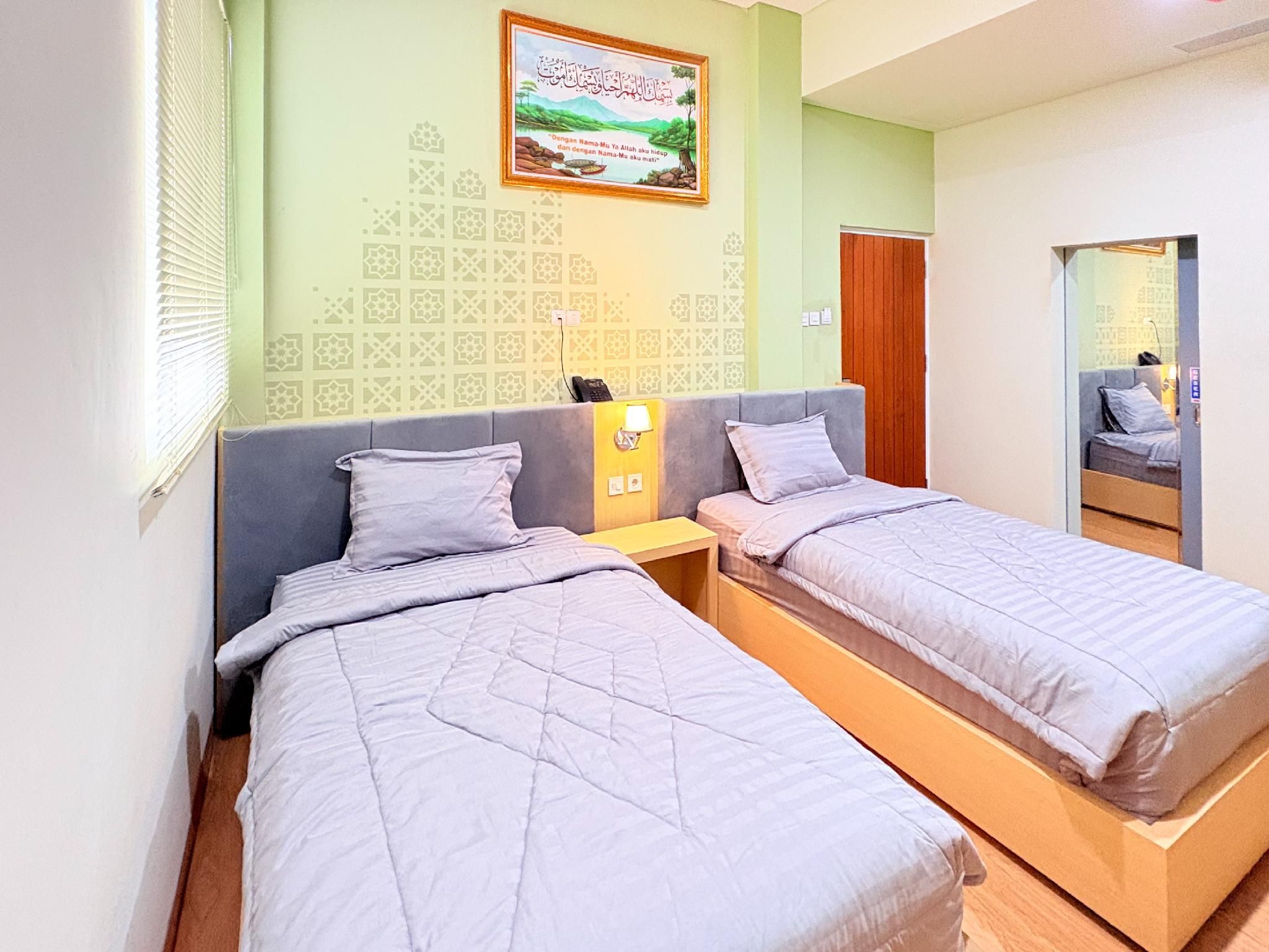 Guest House BMT NU Ngasem RedPartner Bojonegoro Deluxe Twin Room 2