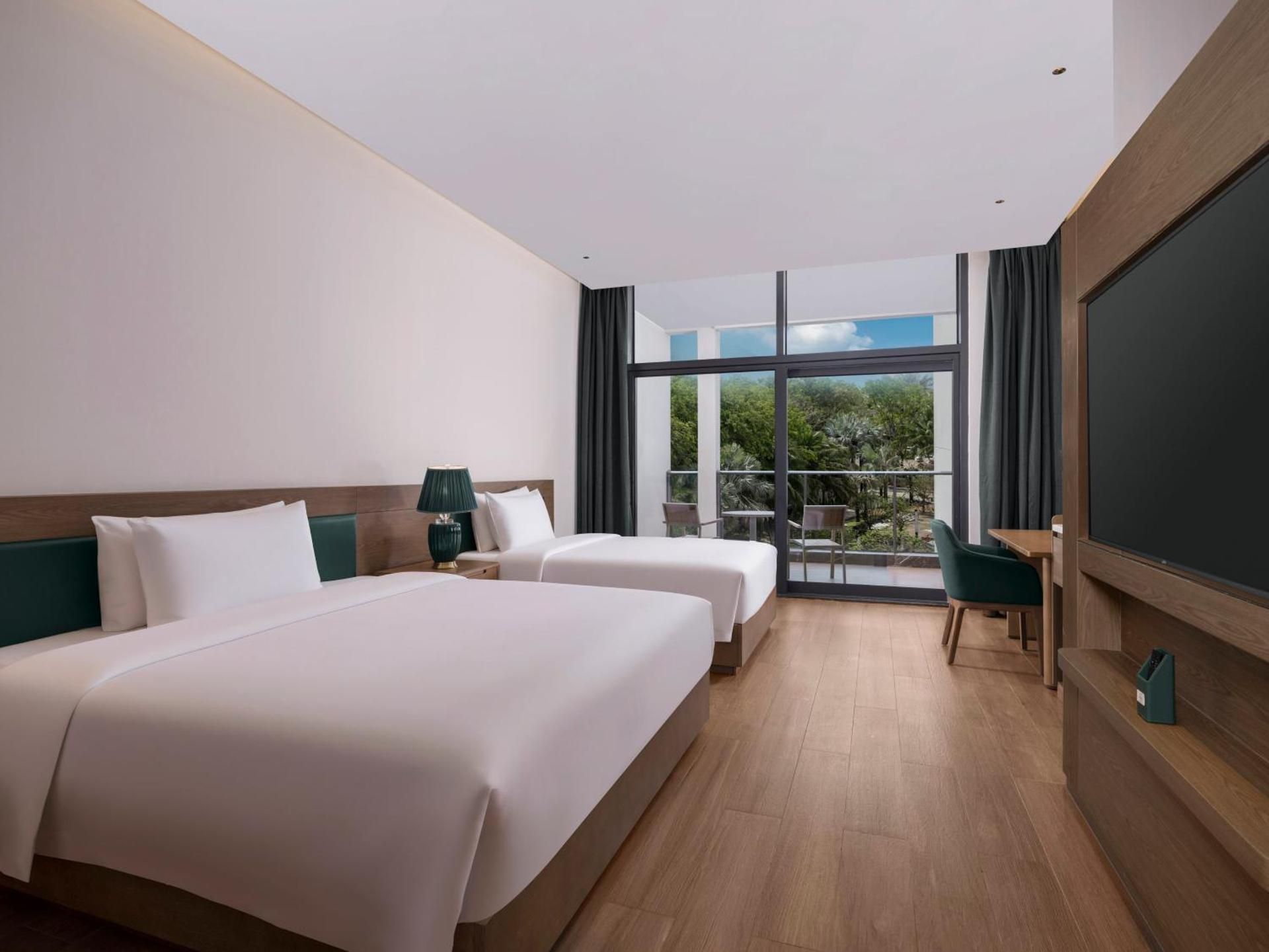 Standard Room with Garden View and Balcony