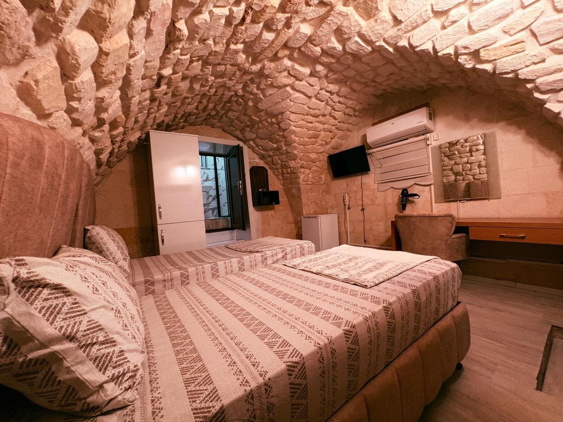 Quadruple Room with Private Bathroom