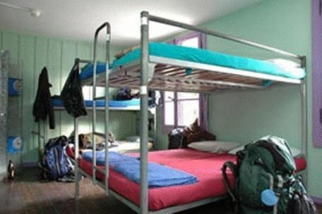 Single Bed in Dormitory Room