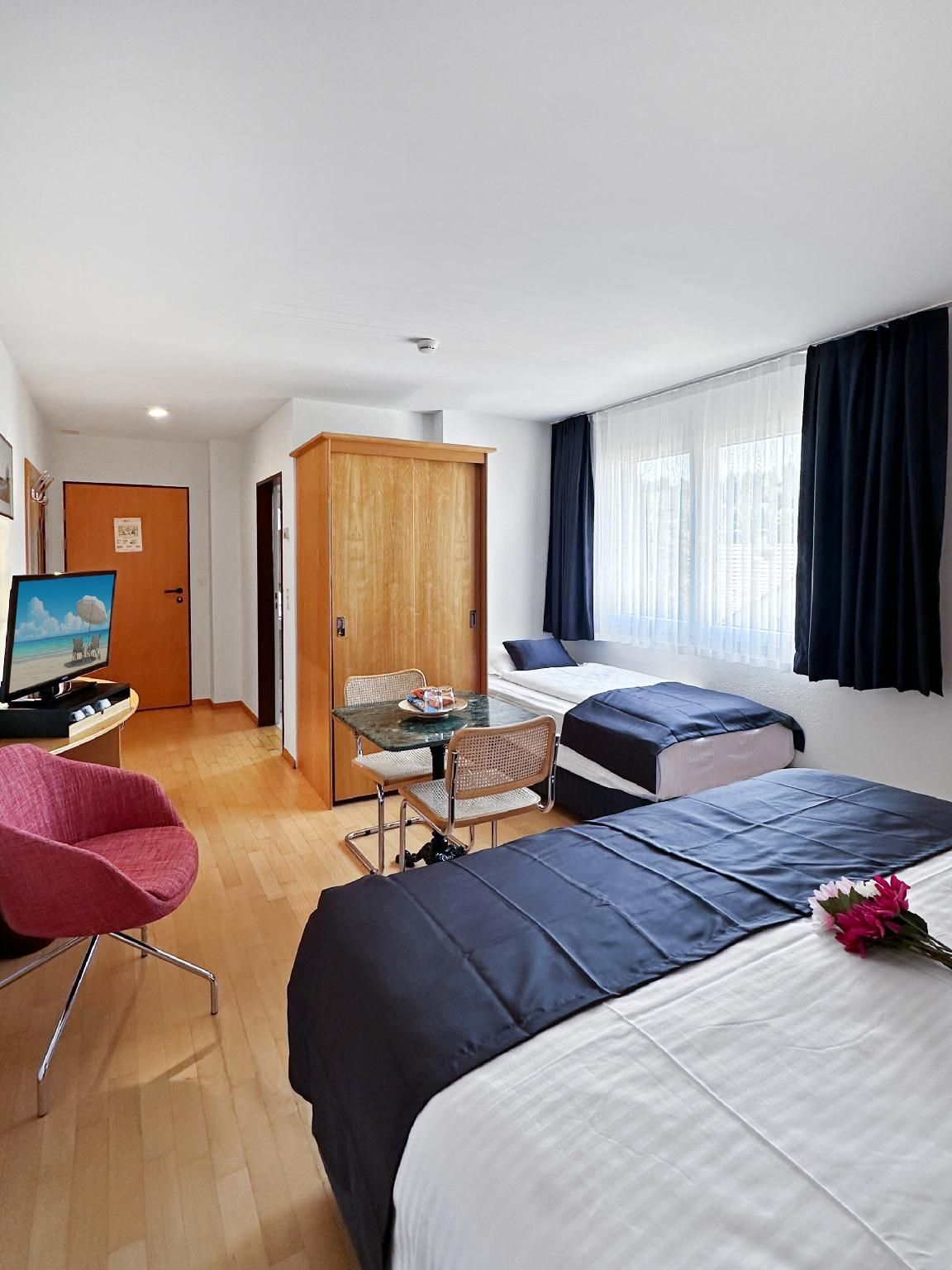 Dreibettzimmer
