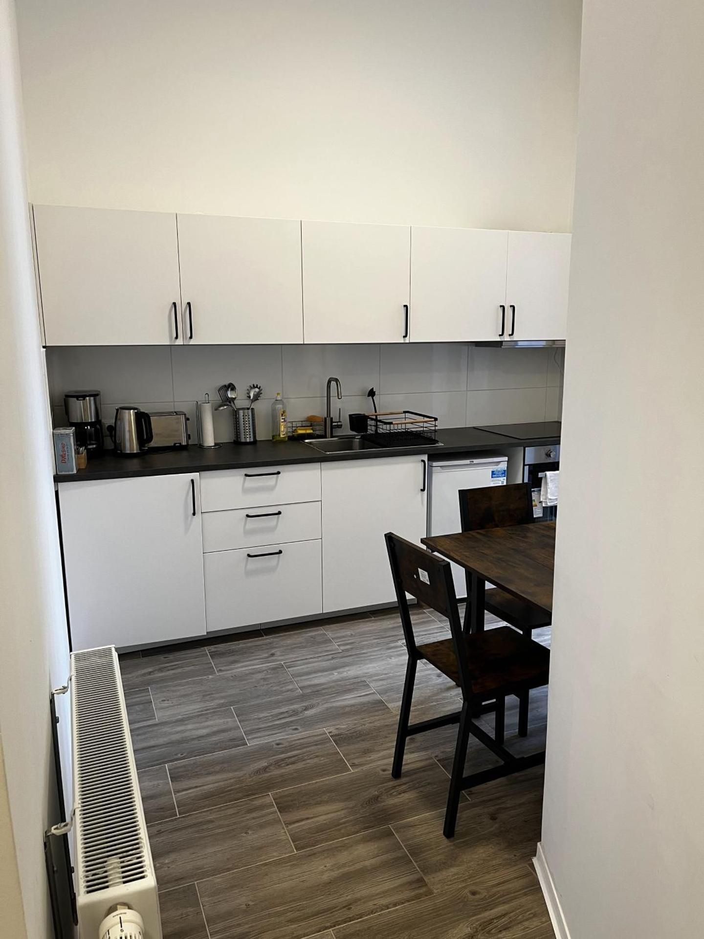 Three-Bedroom Apartment with Balcony