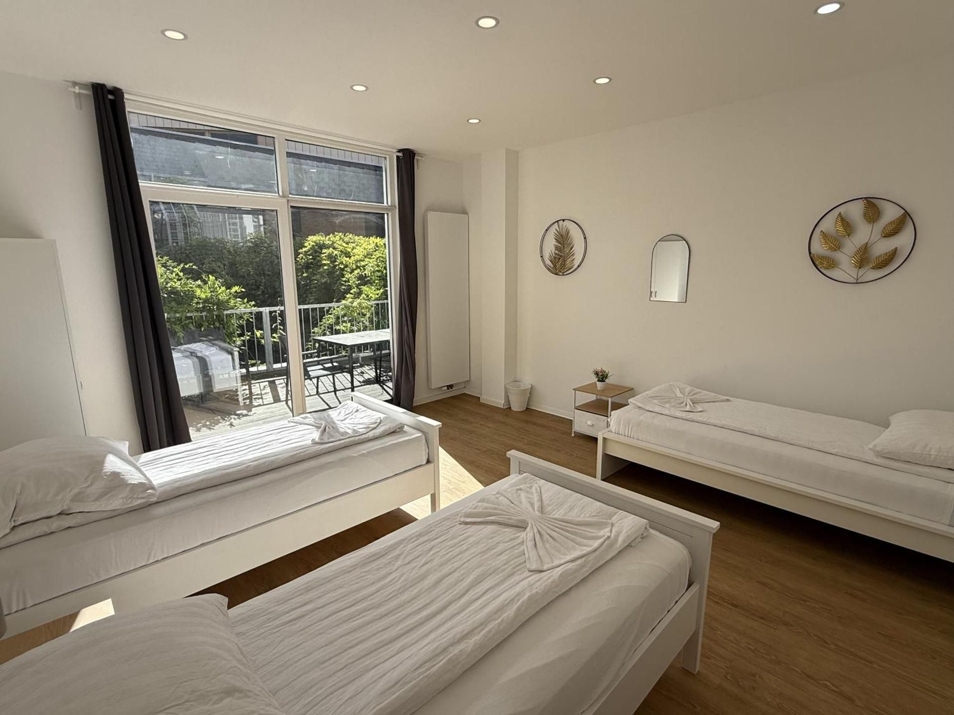 Four-Bedroom Apartment with Balcony