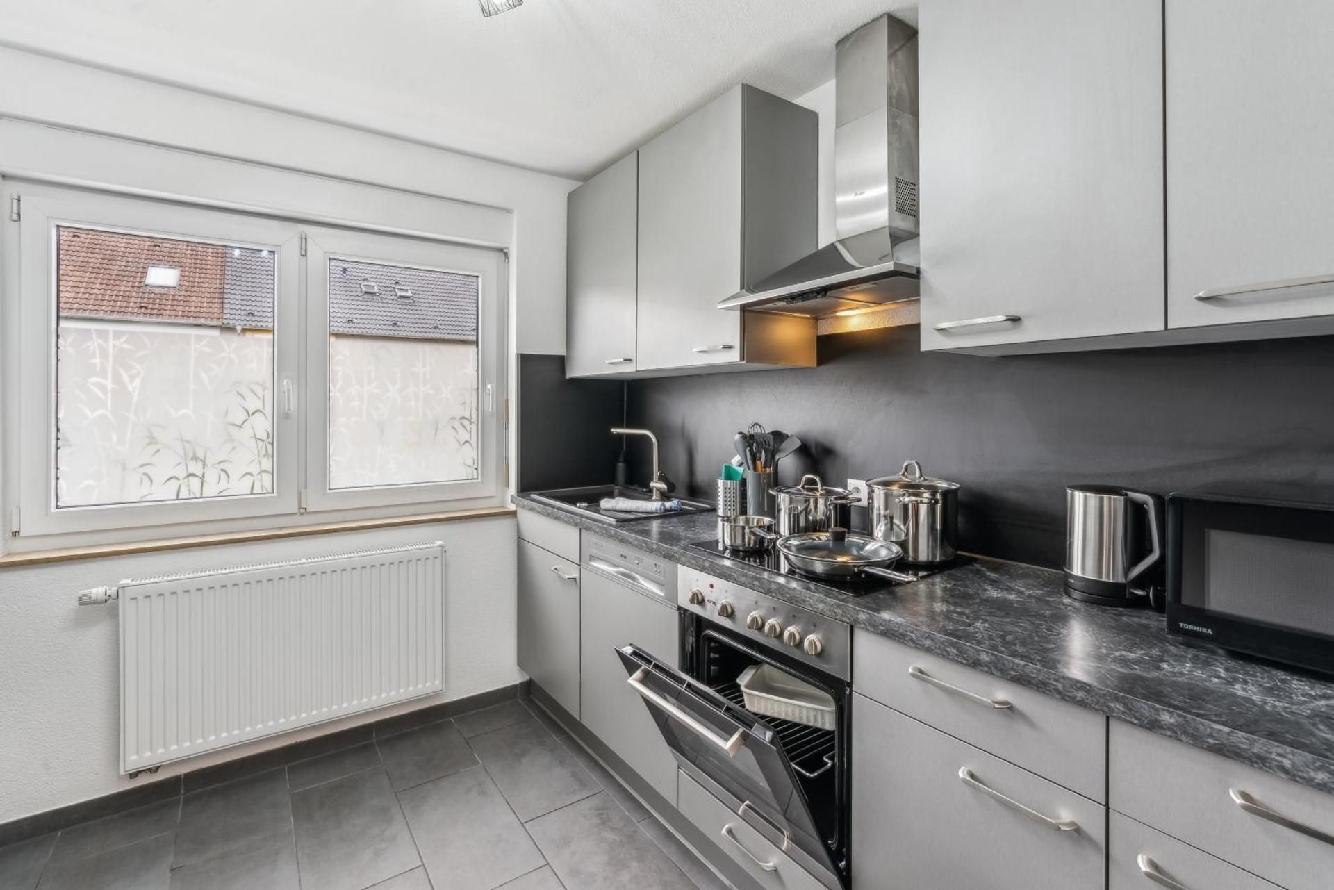 Three-Bedroom Apartment with Balcony