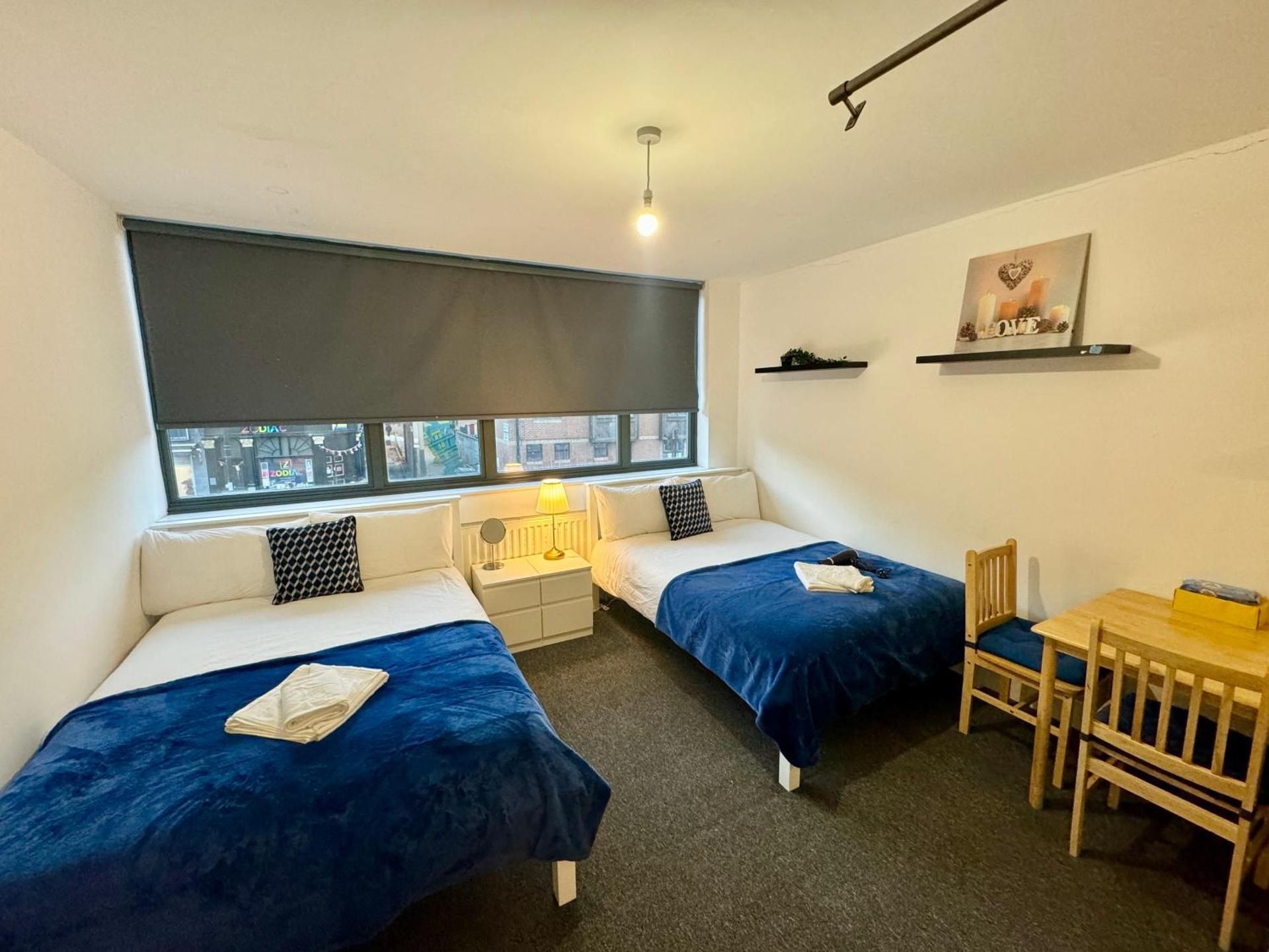 Quadruple Room with Shared Bathroom