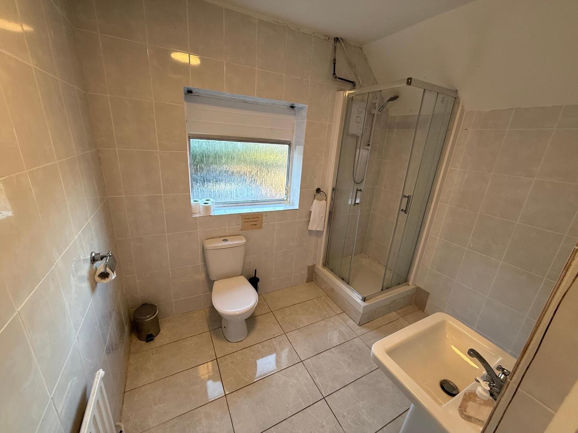 Quadruple Room with Private Bathroom